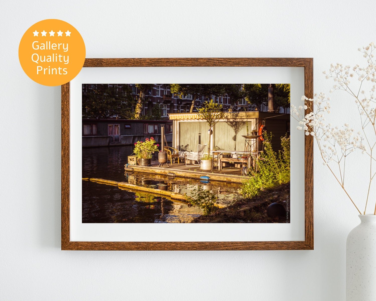 Amsterdam houseboat photography print showcasing Dutch canal life, featuring a charming floating home. Perfect for adding a touch of Netherlands culture to your home decor.