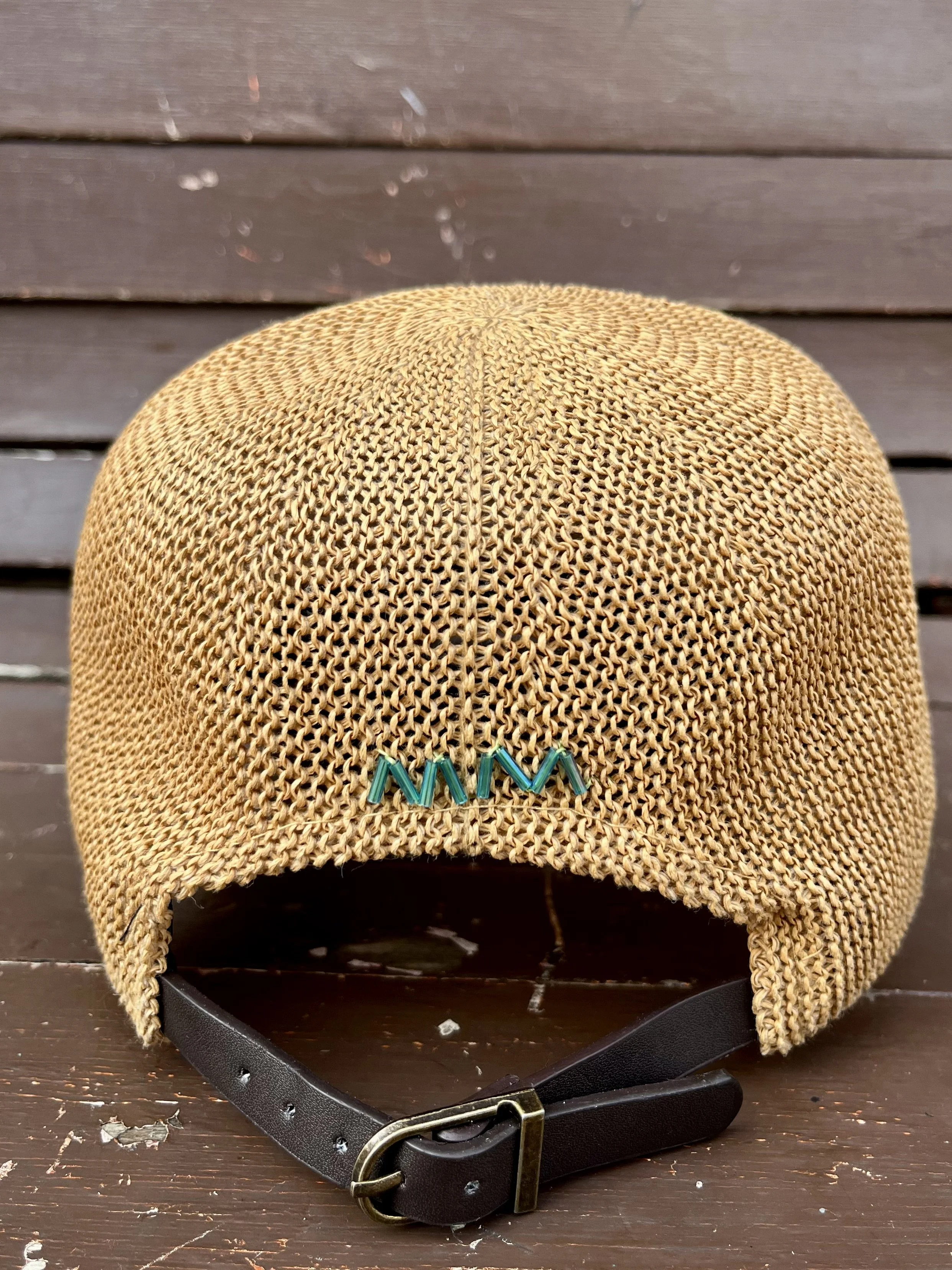 back of tan raffia dad hat