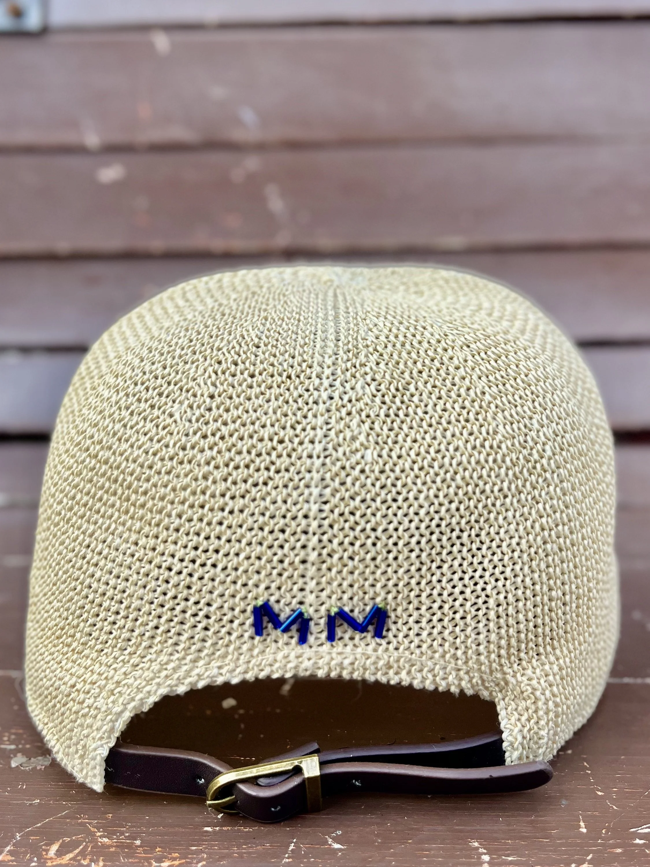 back of raffia hat with buckle detail