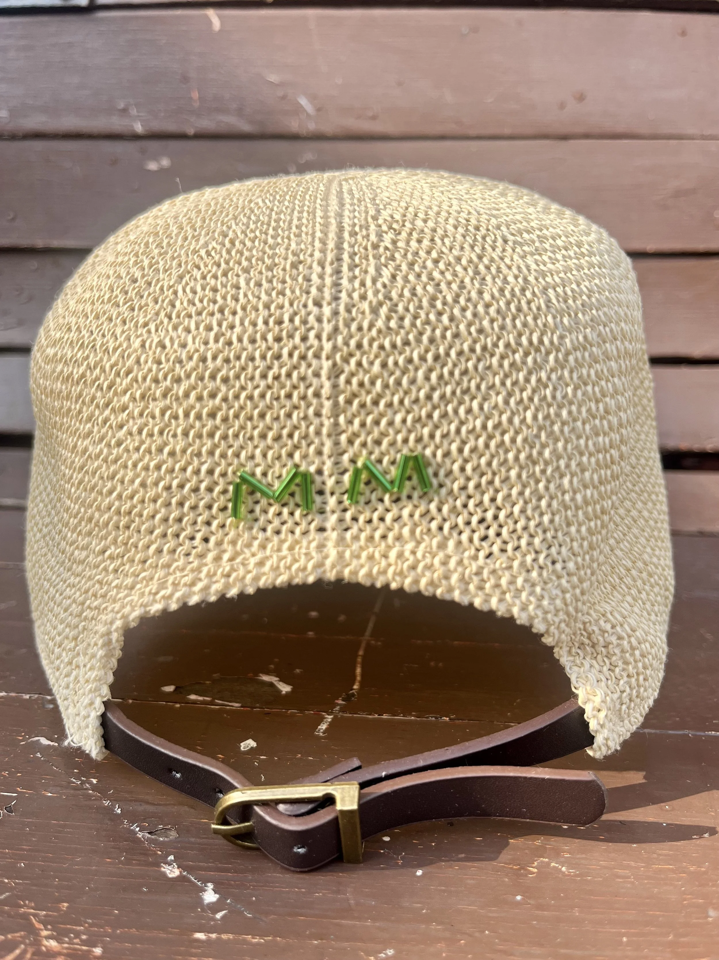 back of raffia hat with buckle detail