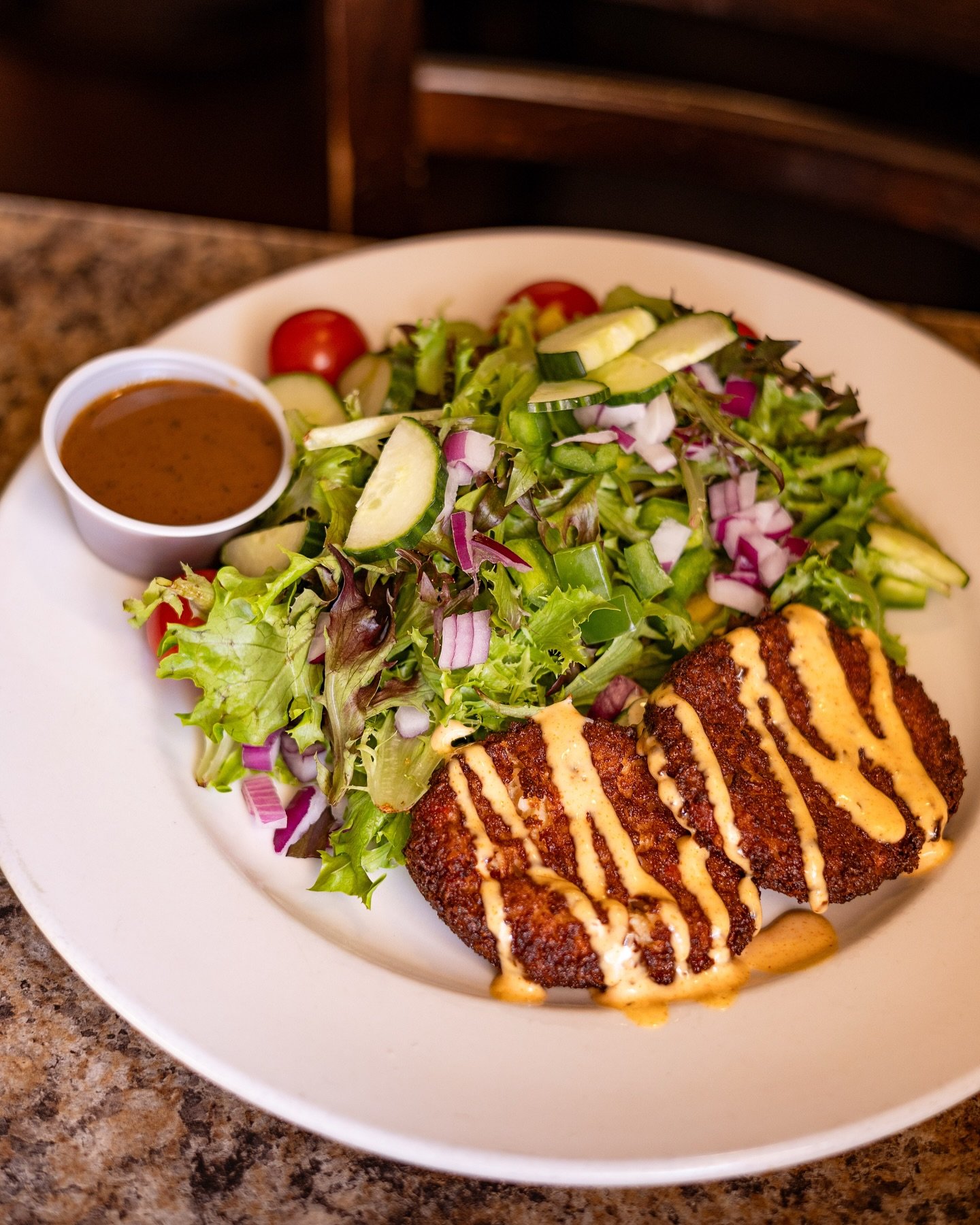 Golden, crispy, and packed with coastal flavour 🦀✨

Our Crab Cakes with Salad are pan-seared to perfection, served with bold Cajun aioli and paired with a fresh garden salad on the side. It&rsquo;s light, indulgent, and straight-up satisfying all at