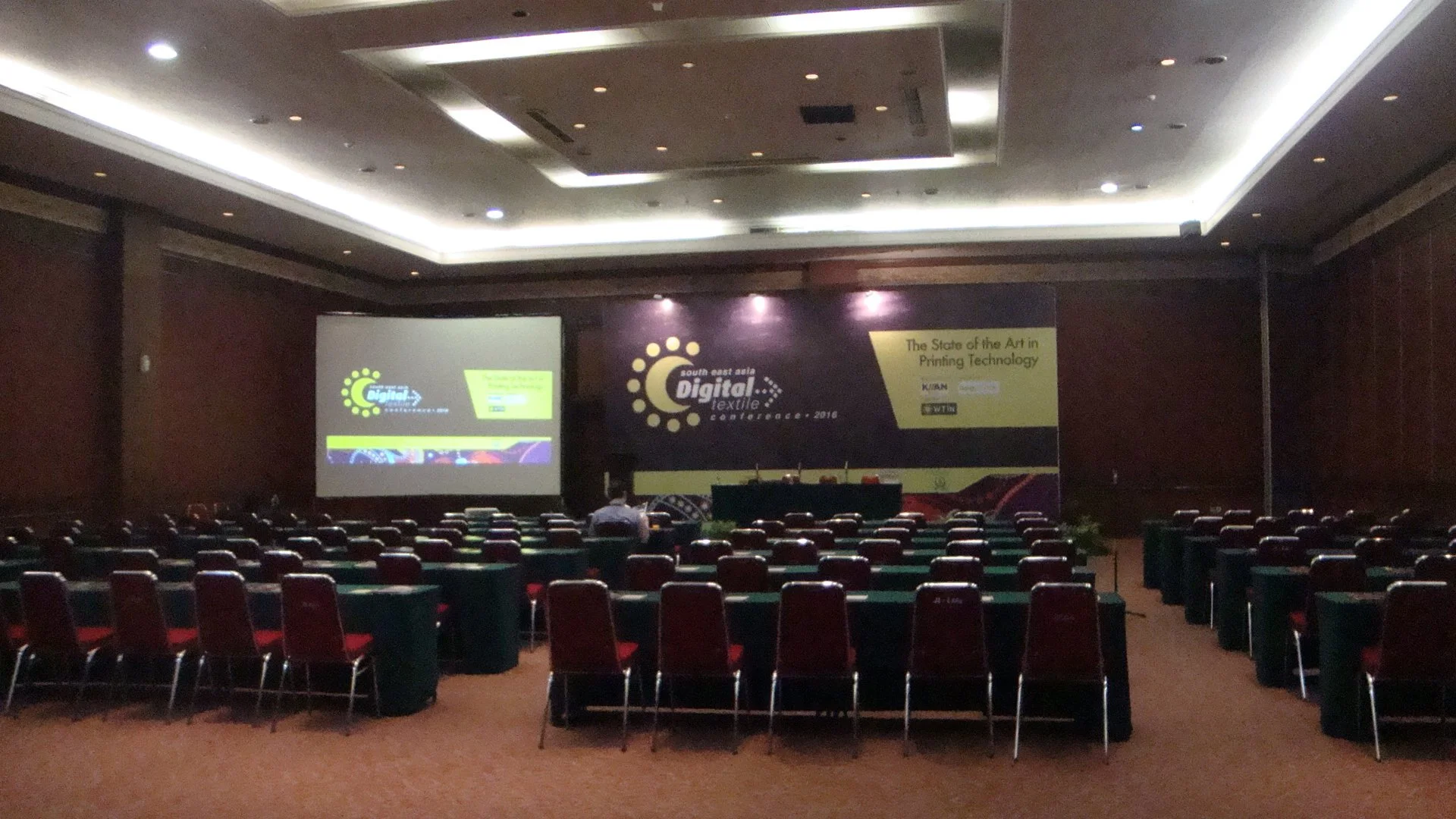 Conference room setup for WTIN event with branding 