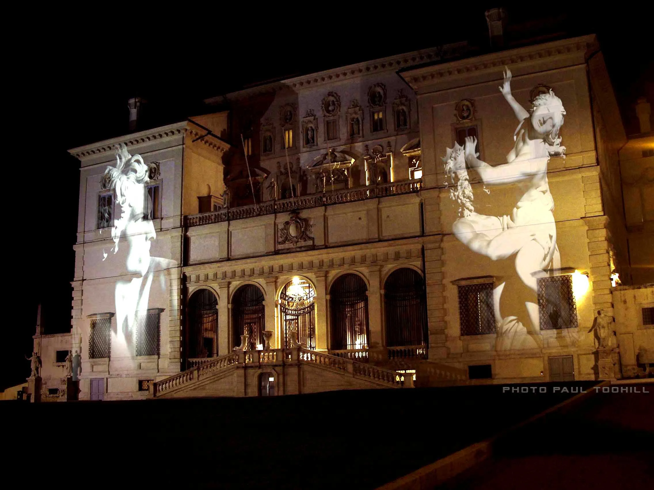 Façade of Borghese Gallery in Rome lit up with artistic video display