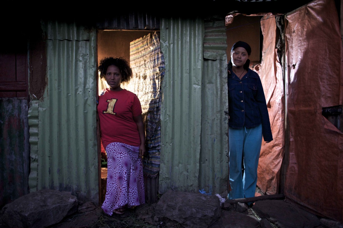  Weinit, 24, and Busunesh, 27, escaped from the same village in Ethiopia a decade after being sold into marriage by their families. They are now sex worker in the "Merkato" neighborhood of Addis Ababa, Ethiopia's capital. 