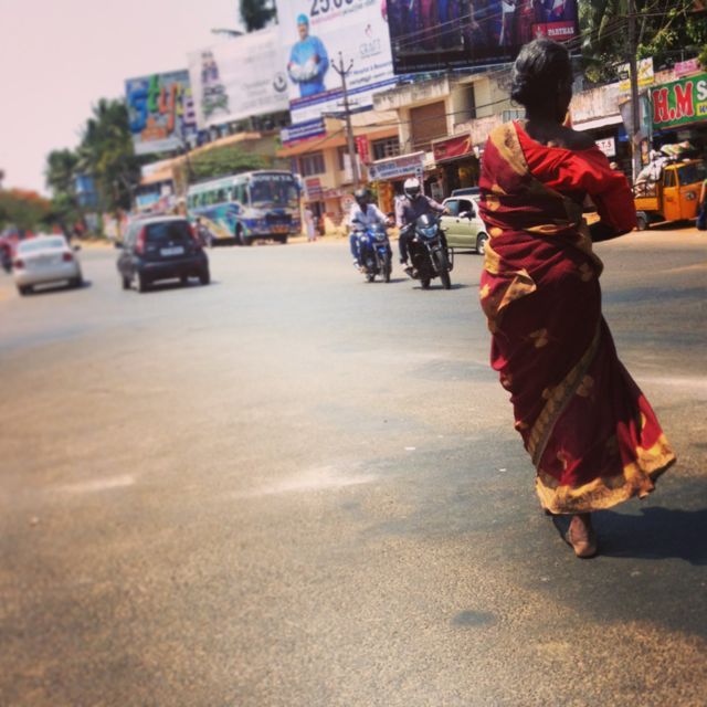  She’s beautiful, confident, unphased by the blazing asphalt on her bare feet…striding gracefully across the busy road. I followed closely, sensing this veteran knew what she was doing… 