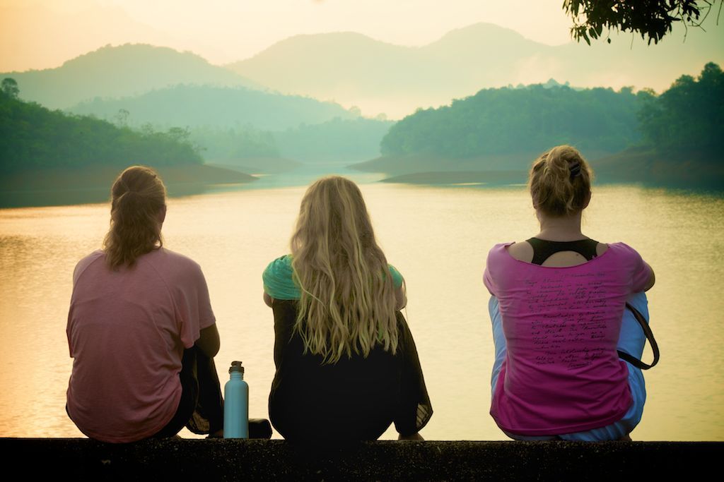  Emi, Lauren, Kate…catching sunrise over the lake. 