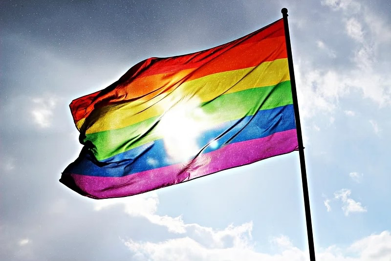 Pride flag waving in the air.