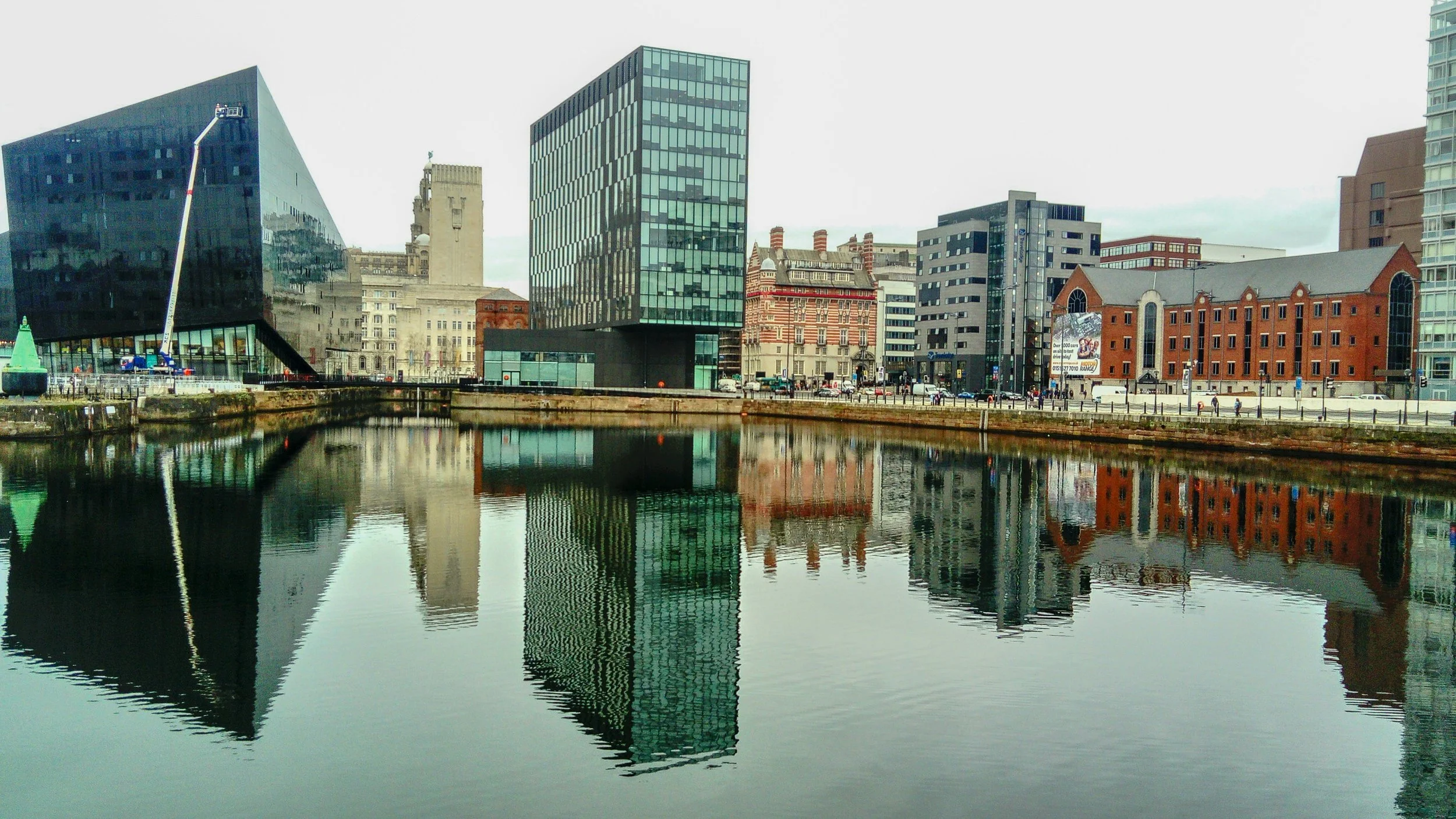 Buildings reflected on water