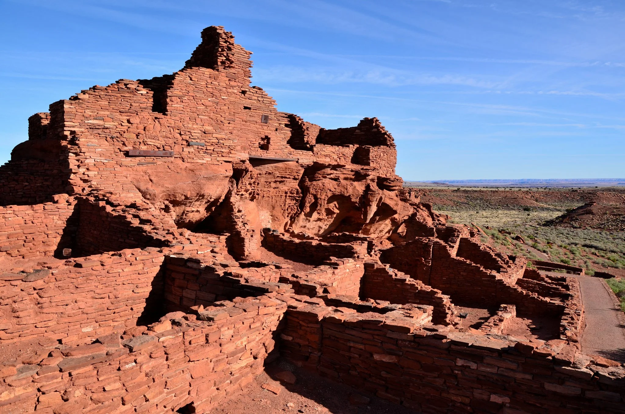 Dilapidated red brick structure.