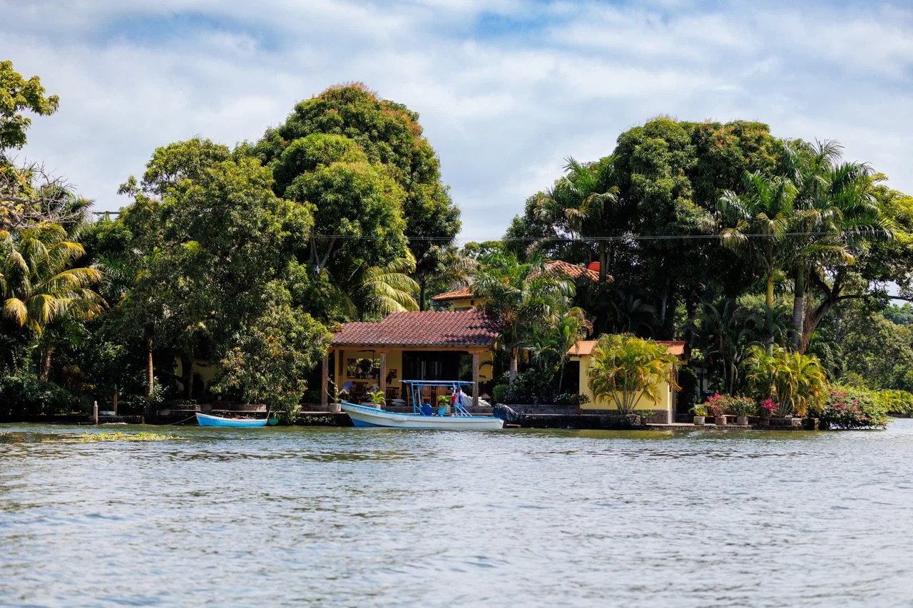 House by the water with boats