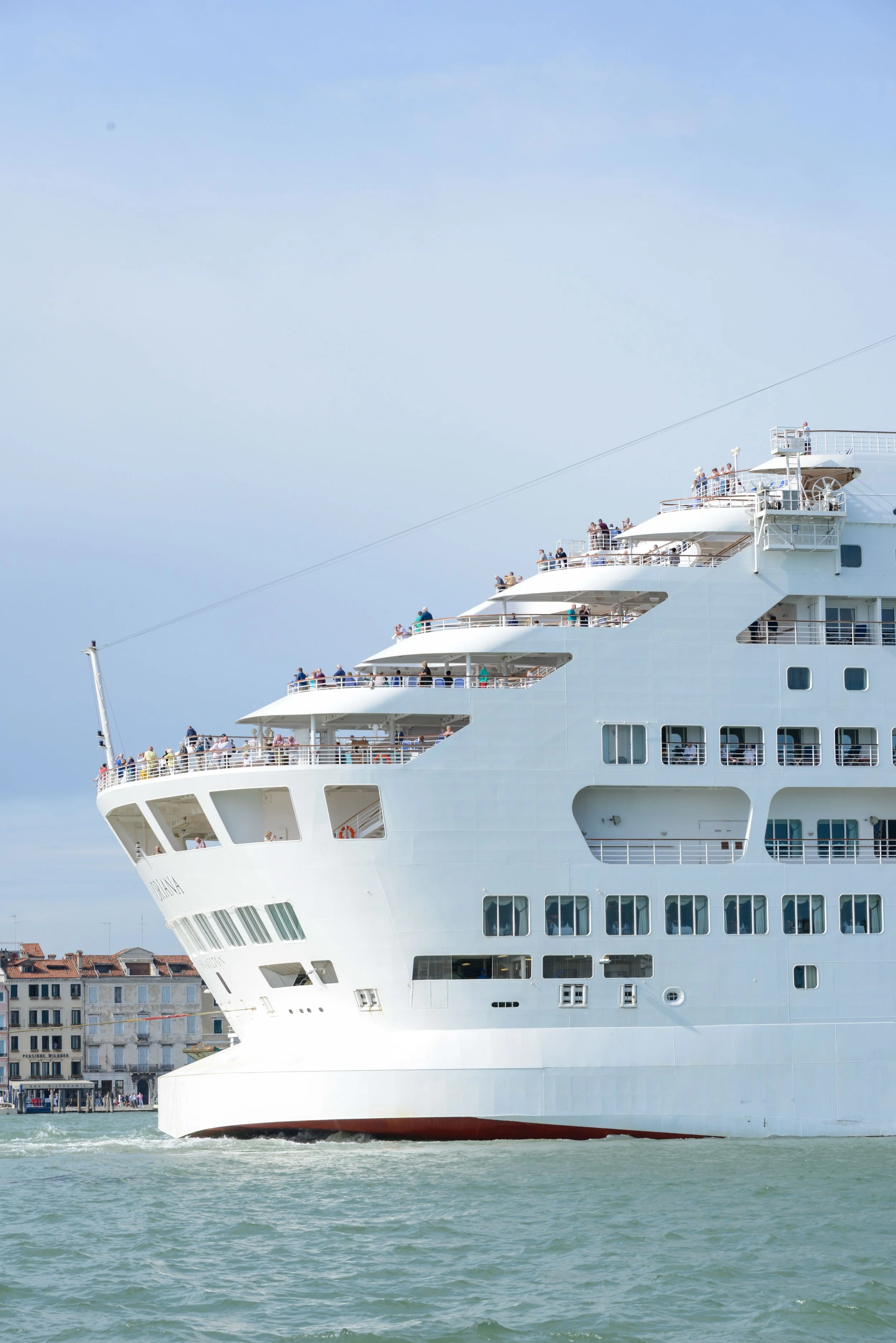 A luxury cruise ship docked in Venice.