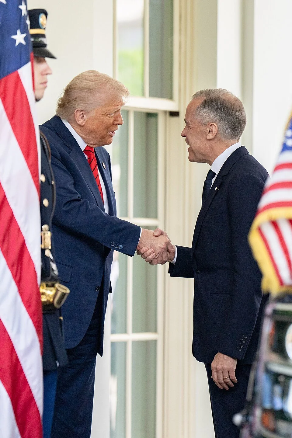 Canadian Prime Minister Mark Carney and U.S. President Donald Trump meet for a bilateral meeting in May 2025. White House.