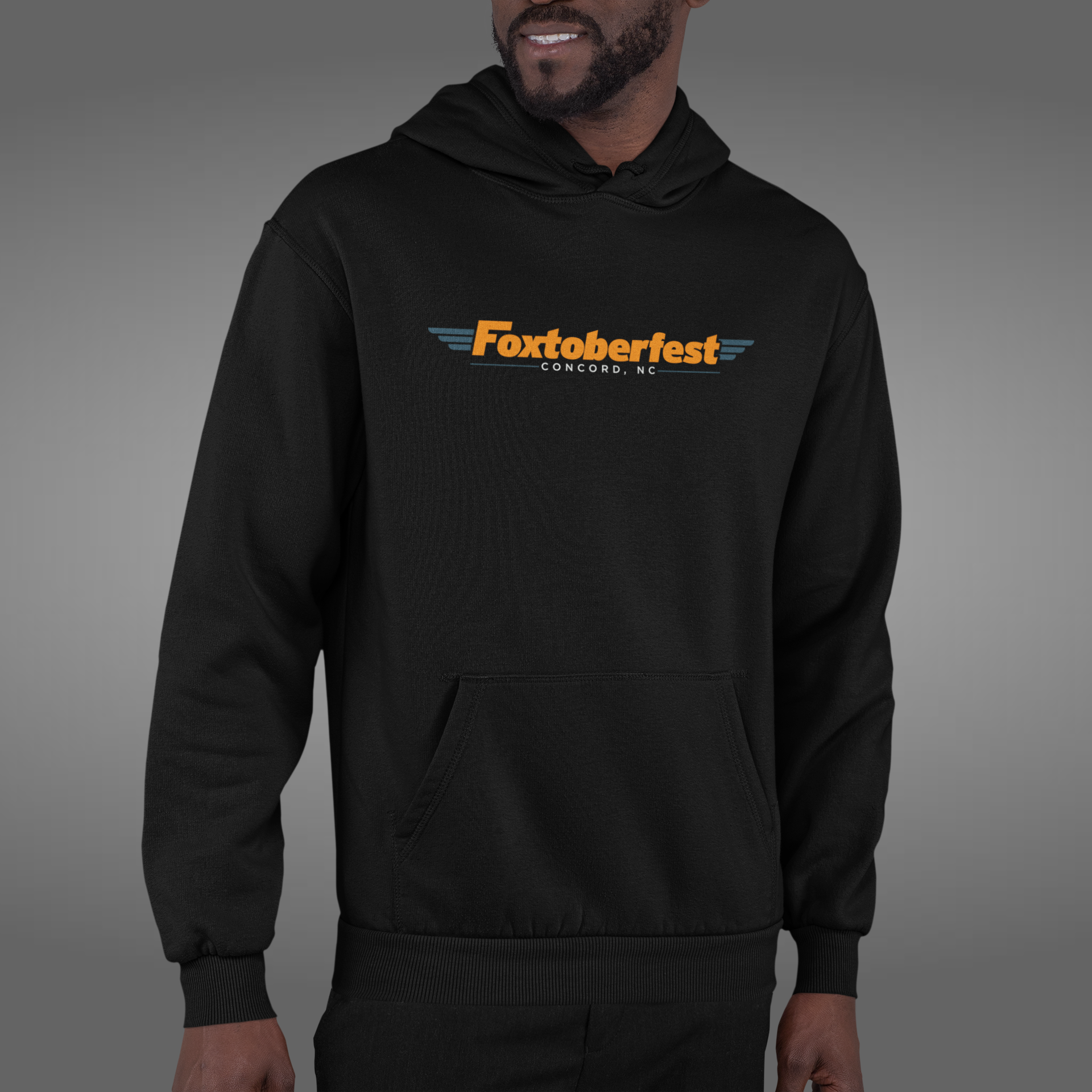 hoodie-mockup-of-a-man-in-a-studio-with-his-face-cropped-m748-12.png