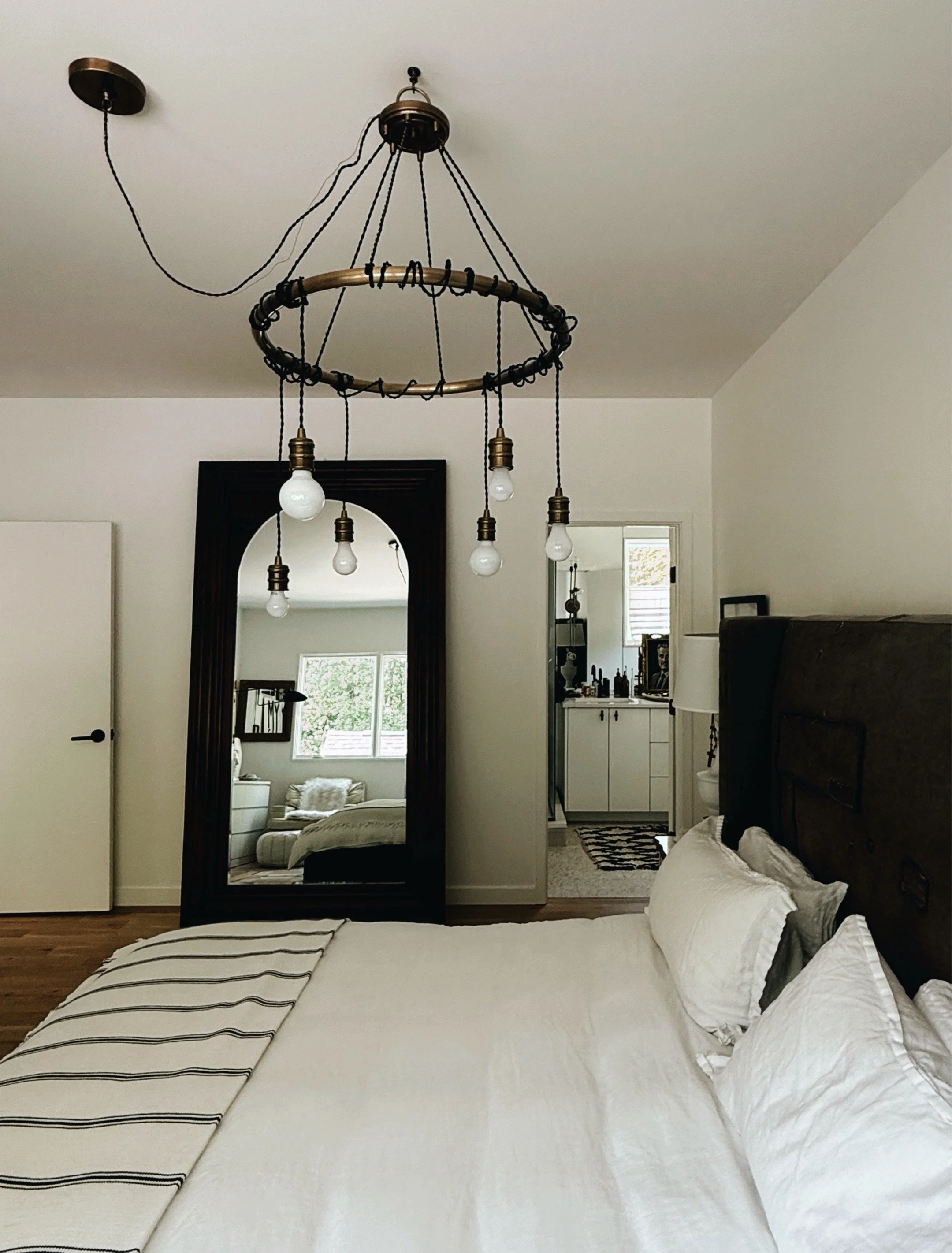 primary bedroom in the charlotte nc modern home of abstract artist michel van devender.