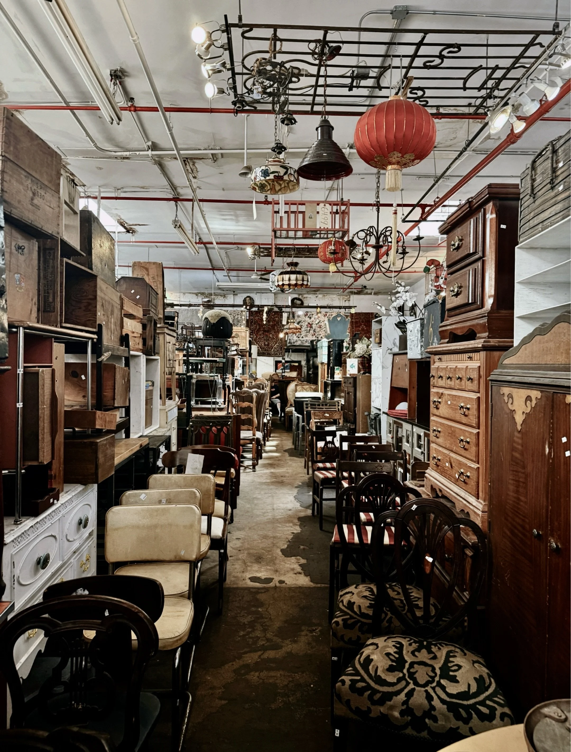 Mother of Junk Vintage, furniture and antiques displayed inside a warehouse in Brooklyn, NY..