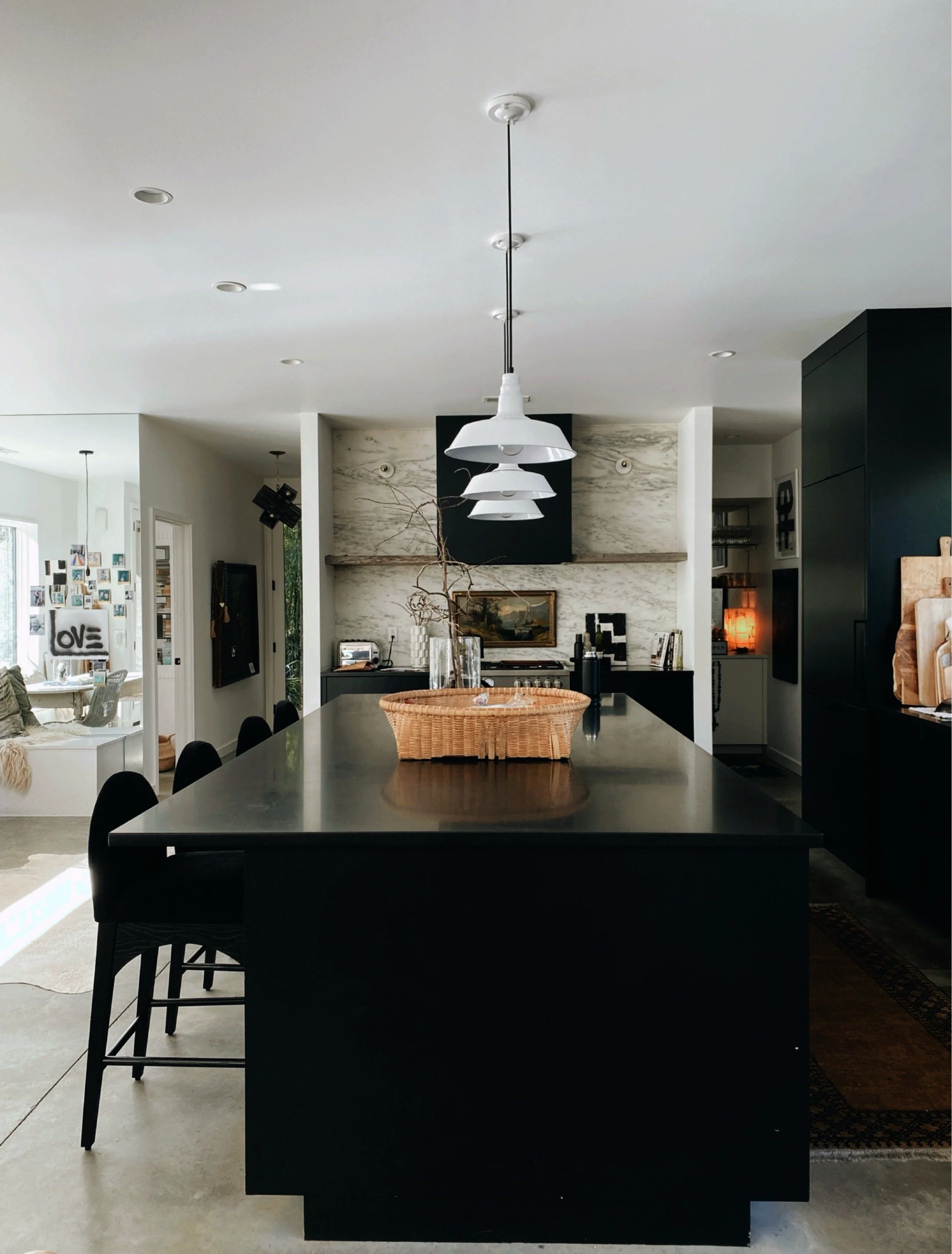 black and white modern kitchen in the home of artist and designer michel van devender.