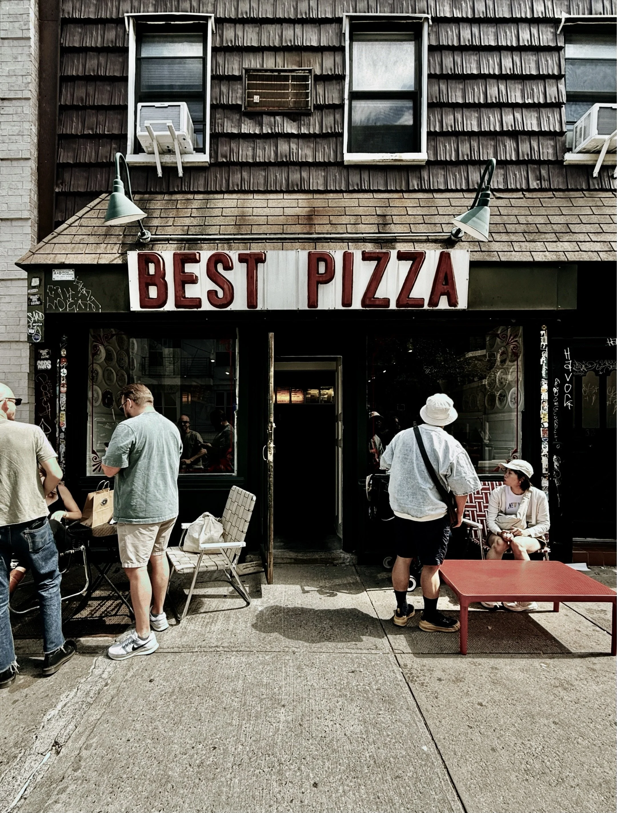 Exterior of Best Pizza restaurant in Brooklyn, New York City.
