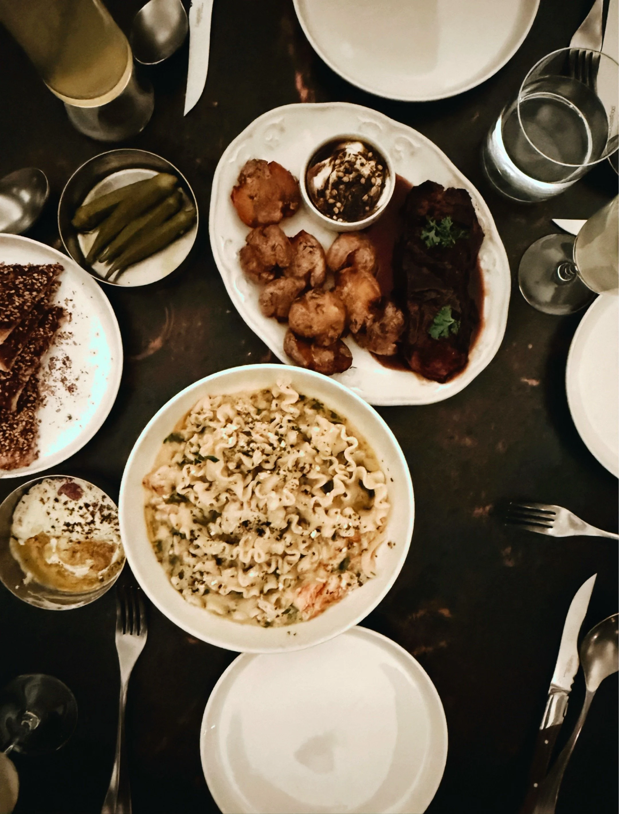 pictured table of food from albertine, charlotte, nc