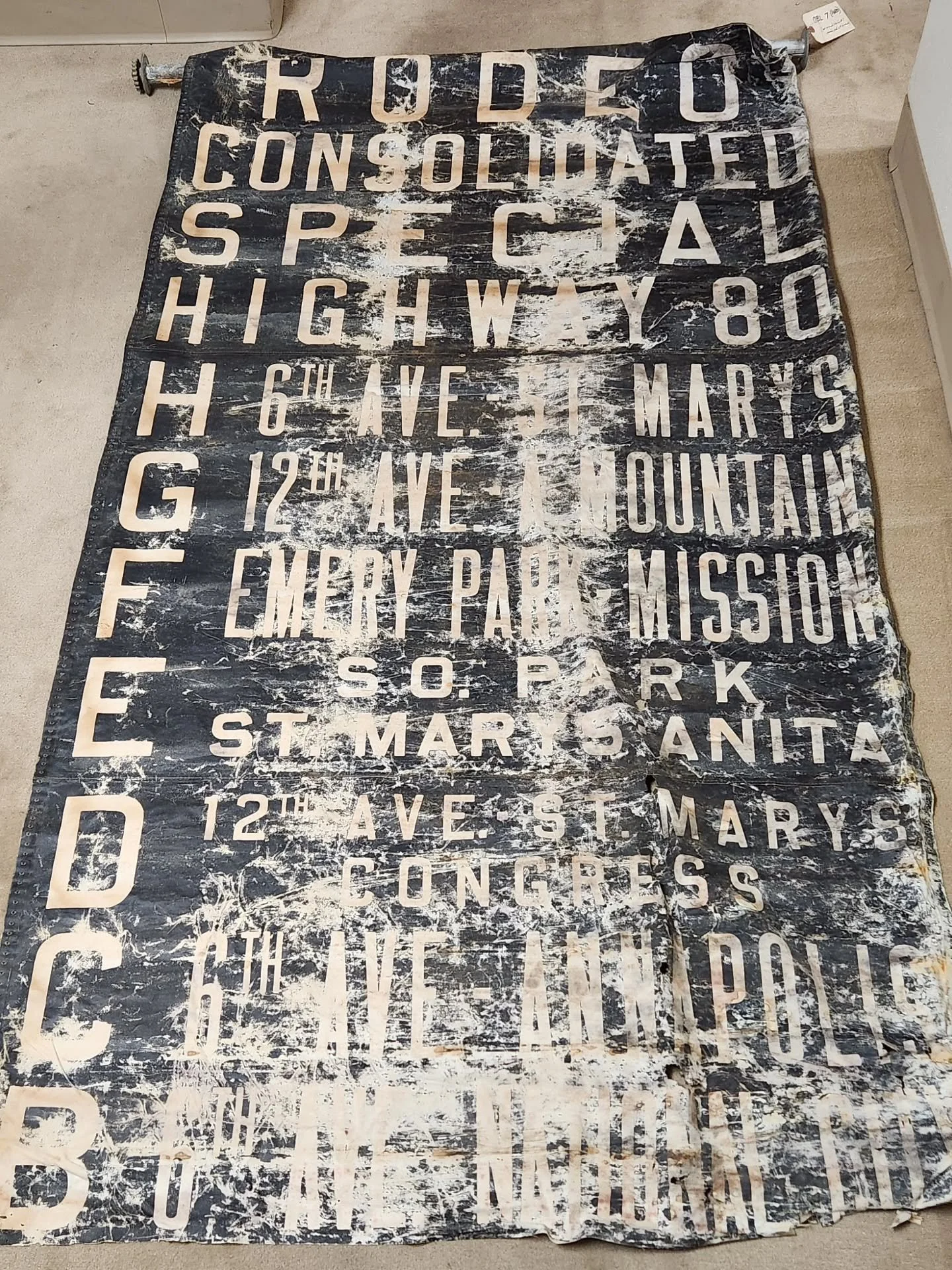 A 1940s Tucson bus rollsign in our collection. This was from an Occidental Bus Lines bus before they became Old Pueblo Transit (like the yellow bus out front of the museum). The last row, Route &quot;A,&quot; has been lost.

&quot;RODEO&quot; was a s