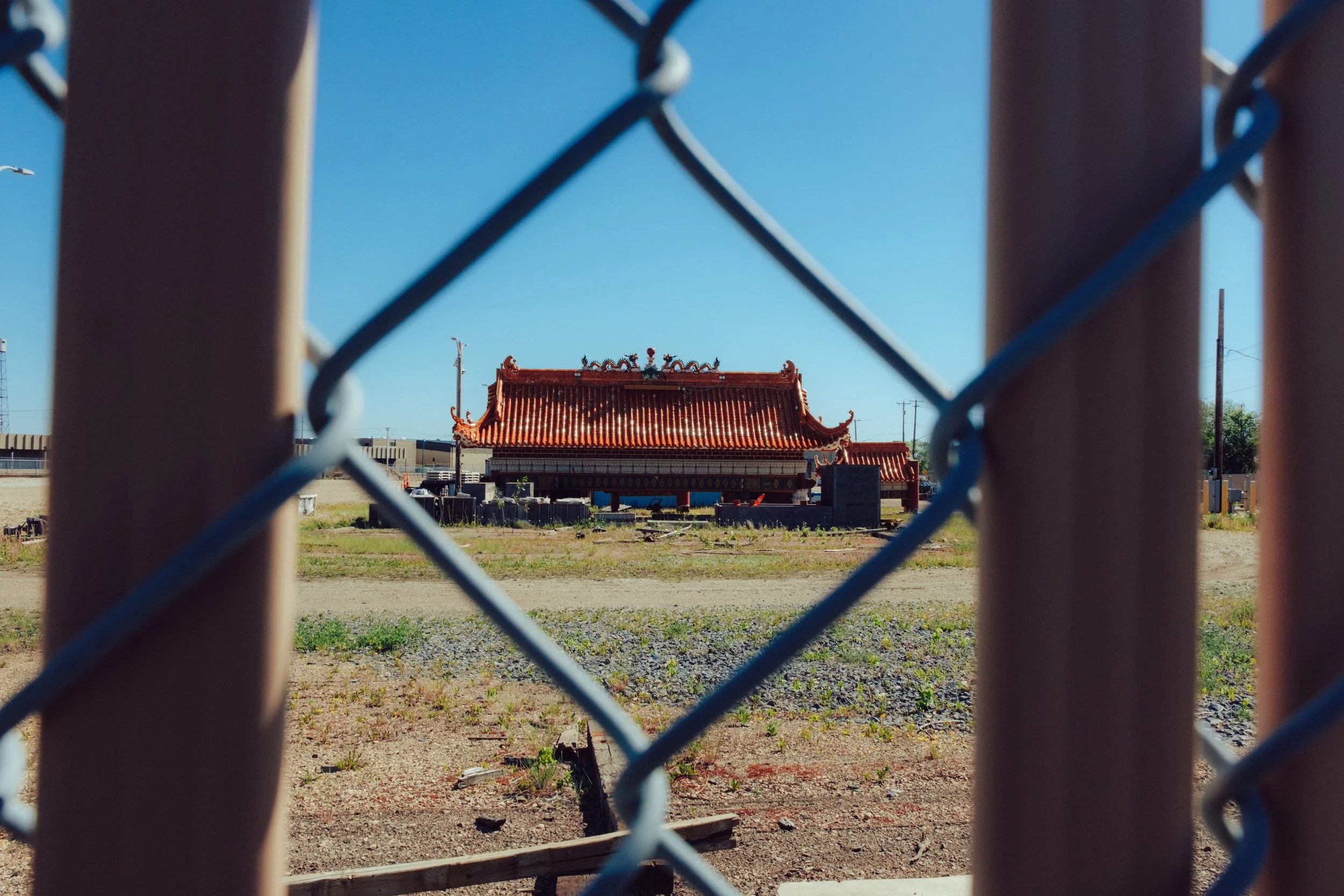 Edmonton's Harbin Gate, dismantled in 2017 for the Light Rail Transit expansion, sits in a storage yard, 2025