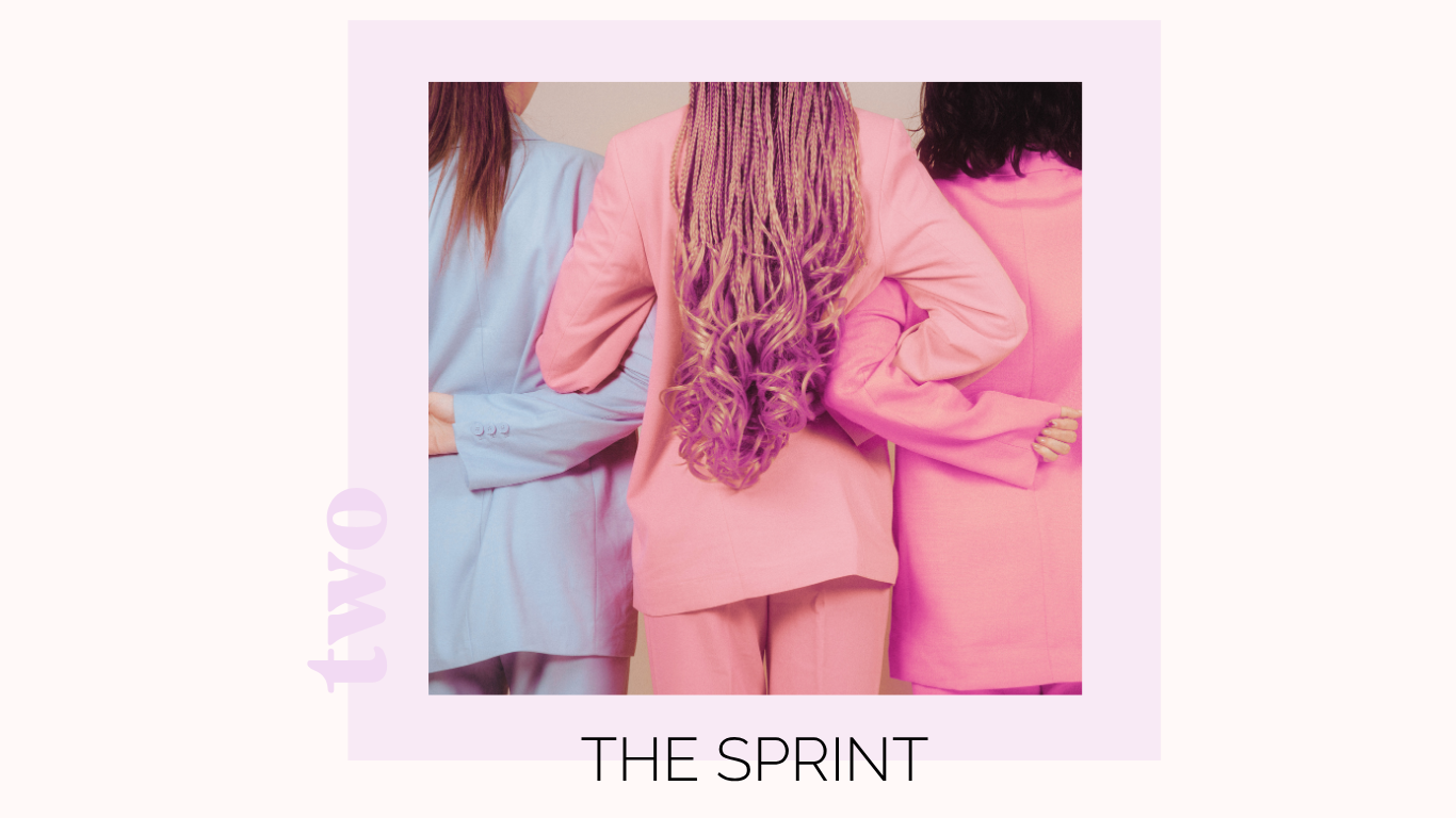 Three women standing side by side with their arms around each other, wearing pastel-colored suits, with their backs to the camera.