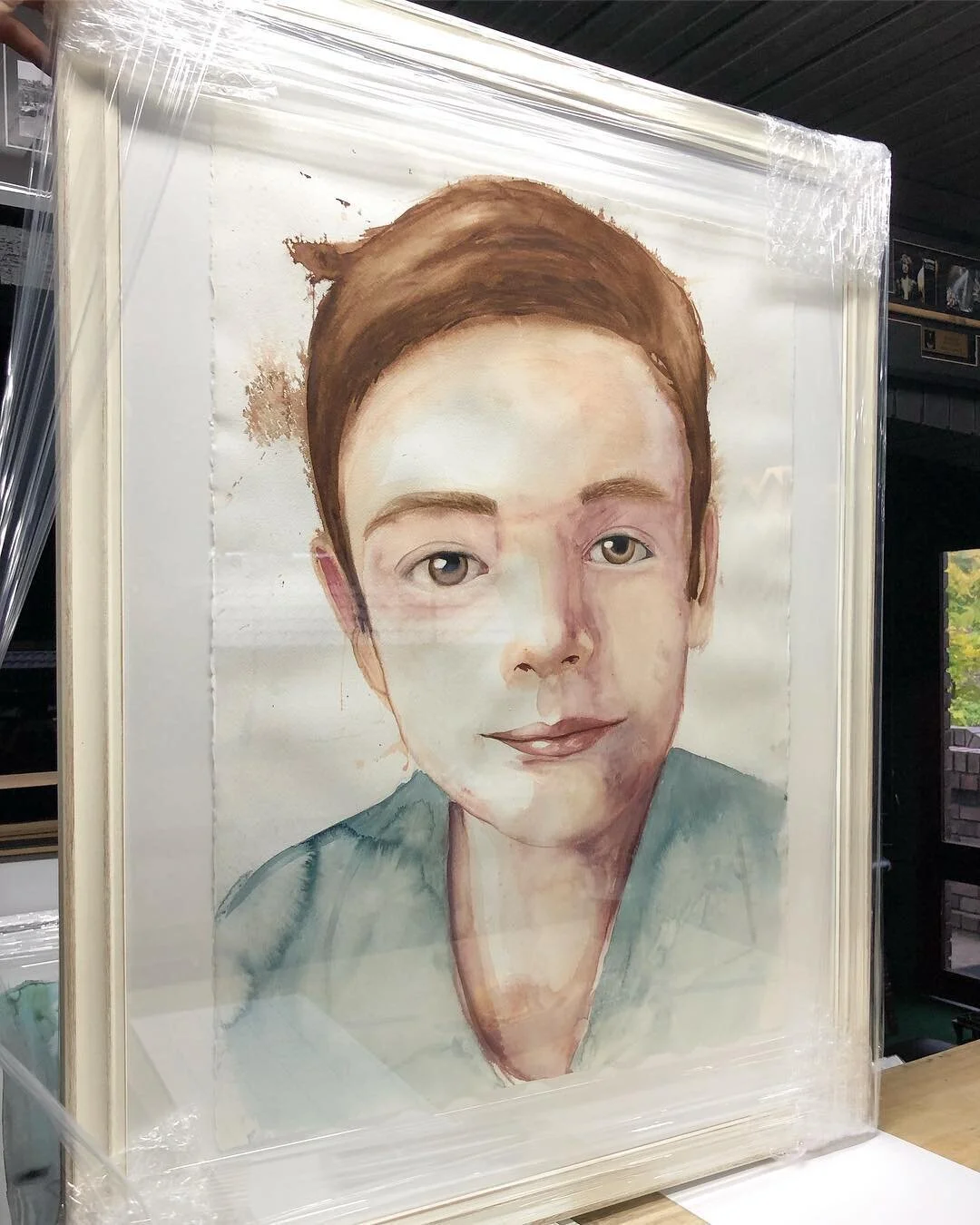 A friend painted this watercolour of her son.  The raw-edge paper is floating inside the off-white shabby frame &amp; looks beautiful 😇.
.
#framing #framinghell #customframing #familyportait #painting #drawing #watercolour #boyslove #framedandready 