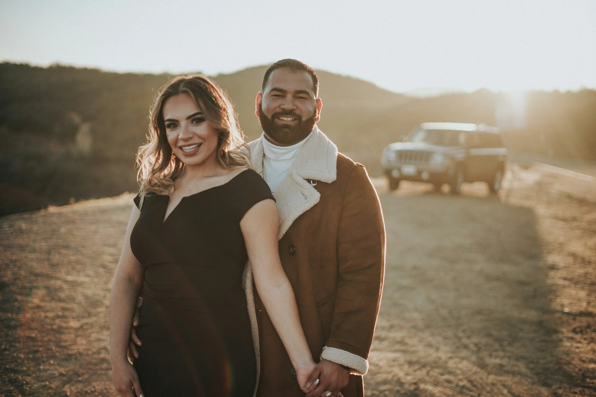 different race couple take photos together