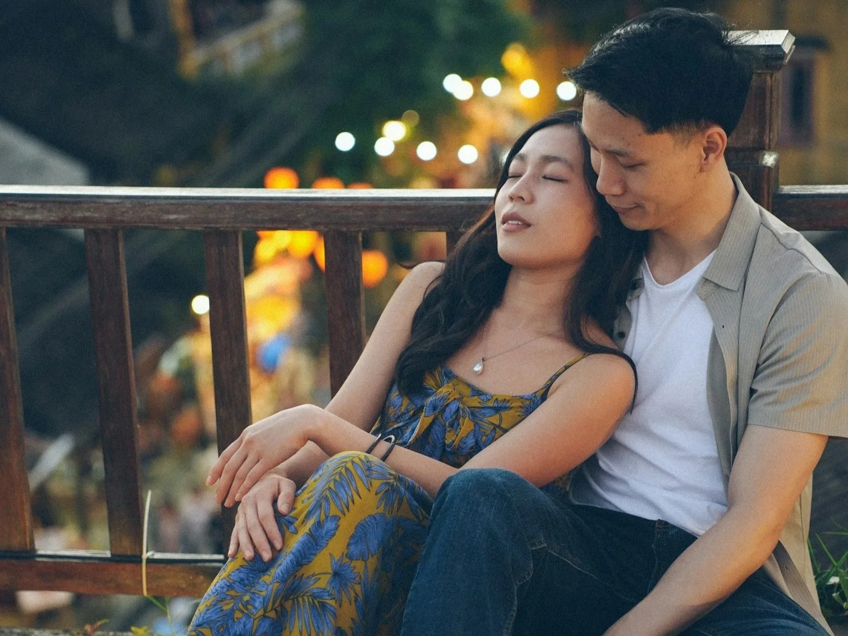 Couple sitting together on a patio relaxing
