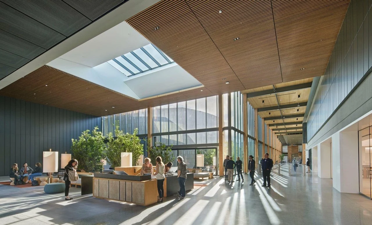 Micorosoft Silicon Valley Reception Lobby with custom reception desk featuring cold-rolled steel, caned face detail, and fully accessible counter height for any users.