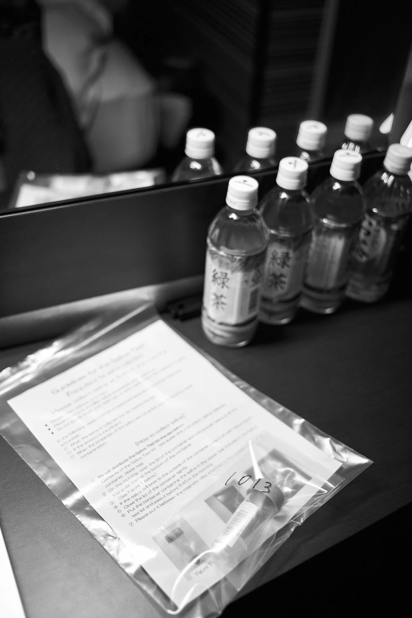 Photograph of COVID19 test in a quarantine hotel room in Osaka, Japan by Xavier Andujar.