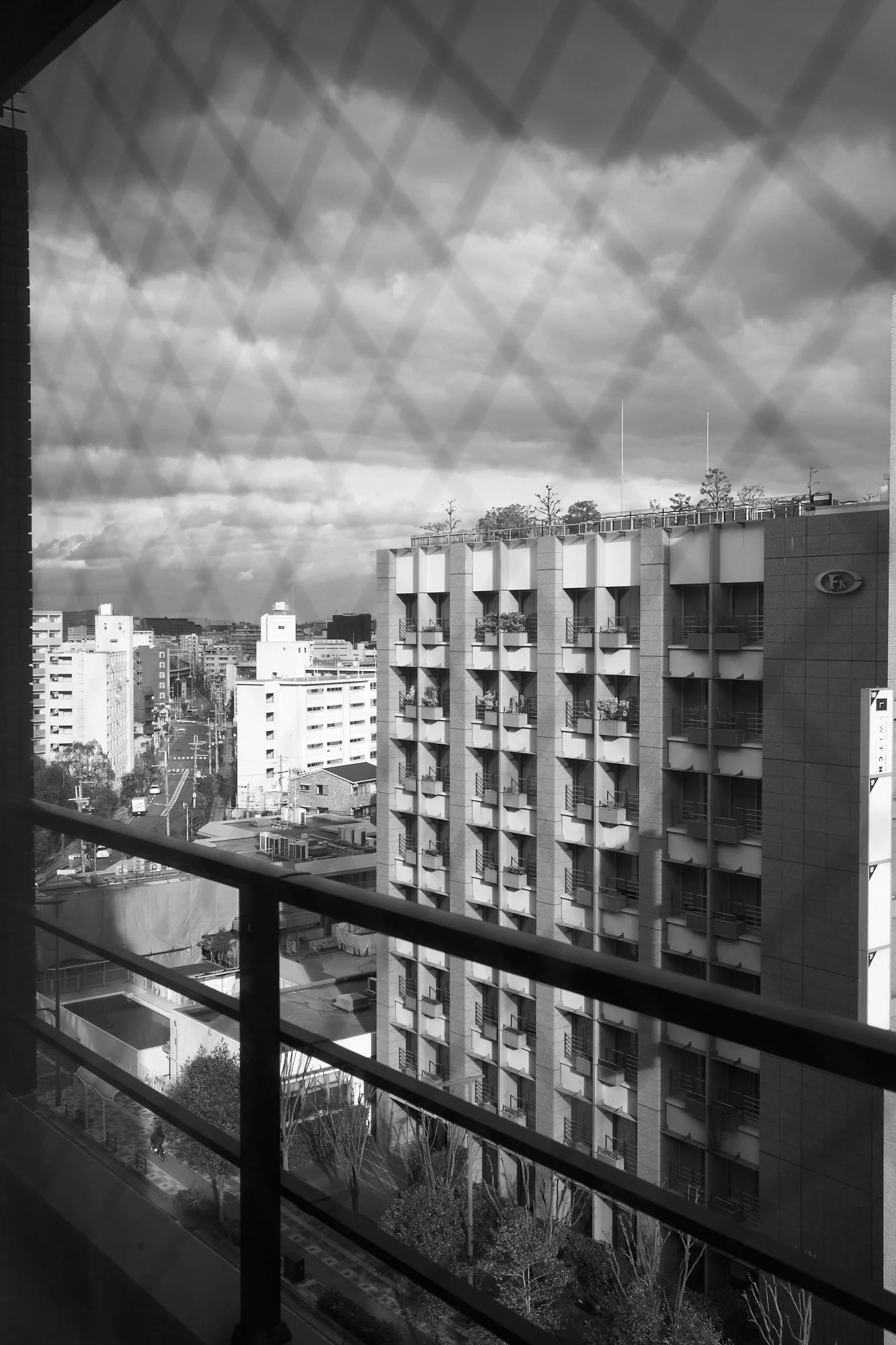 View from a quarantine hotel room in Osaka, capturing the isolation of the COVID-19 pandemic.