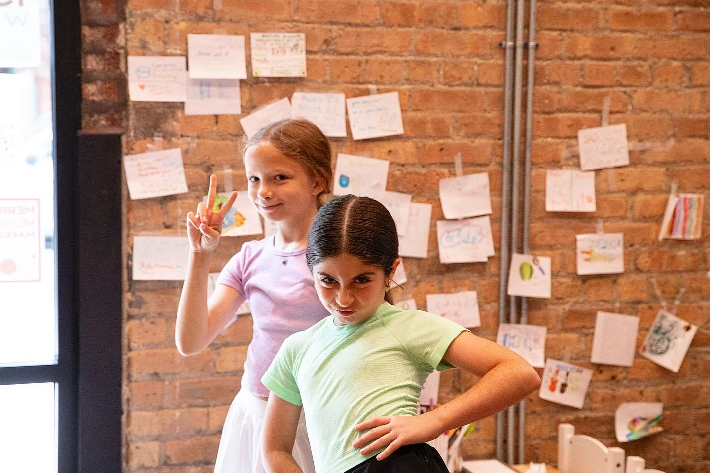 Two campers pose sassily for the a picture