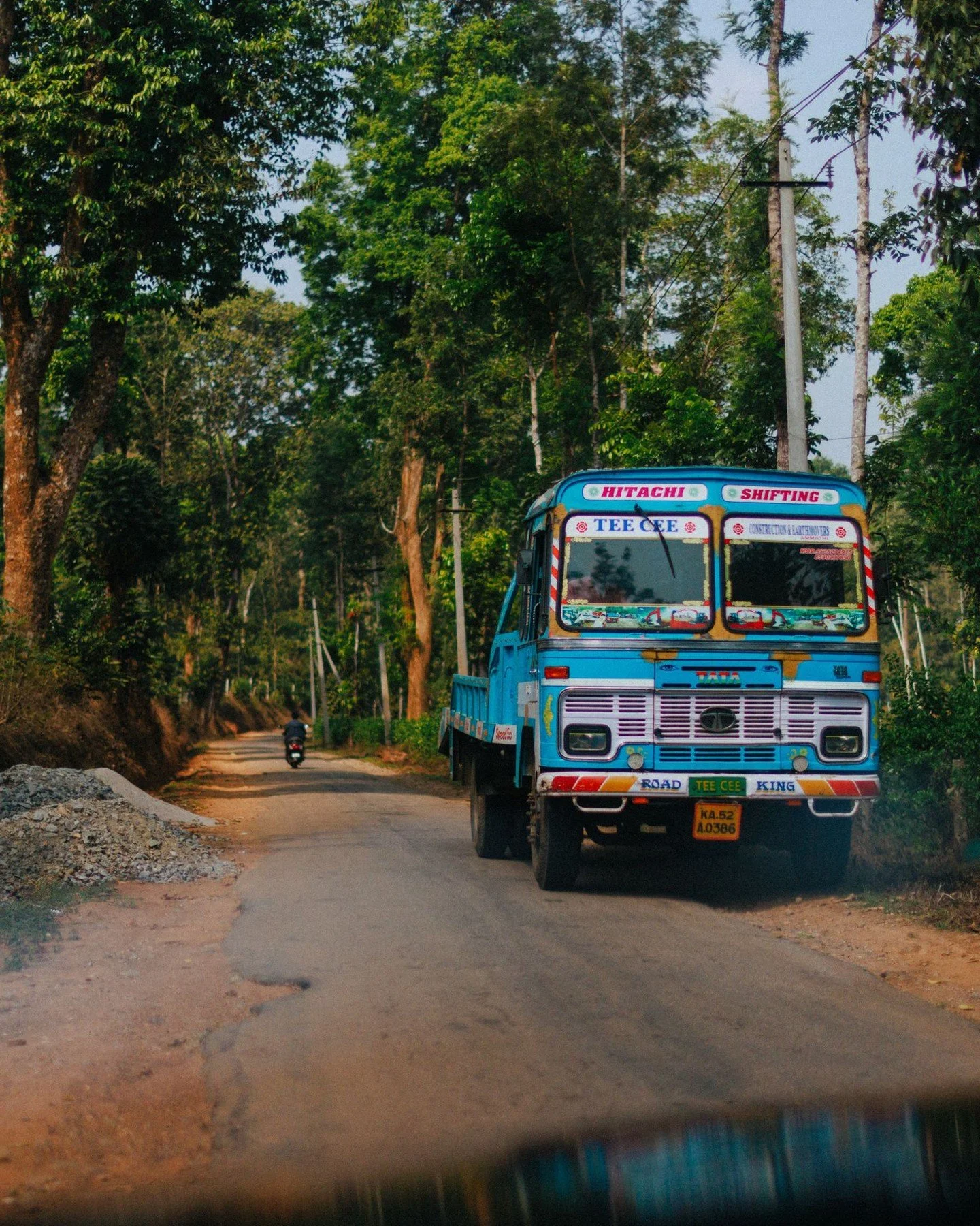 I had been trying to capture a good shot of one of these elaborately decorated buses for so long.
So when I saw this one approaching in the distance, I decided to just shoot it through the car window.

Not exactly how I wanted to capture it, but look