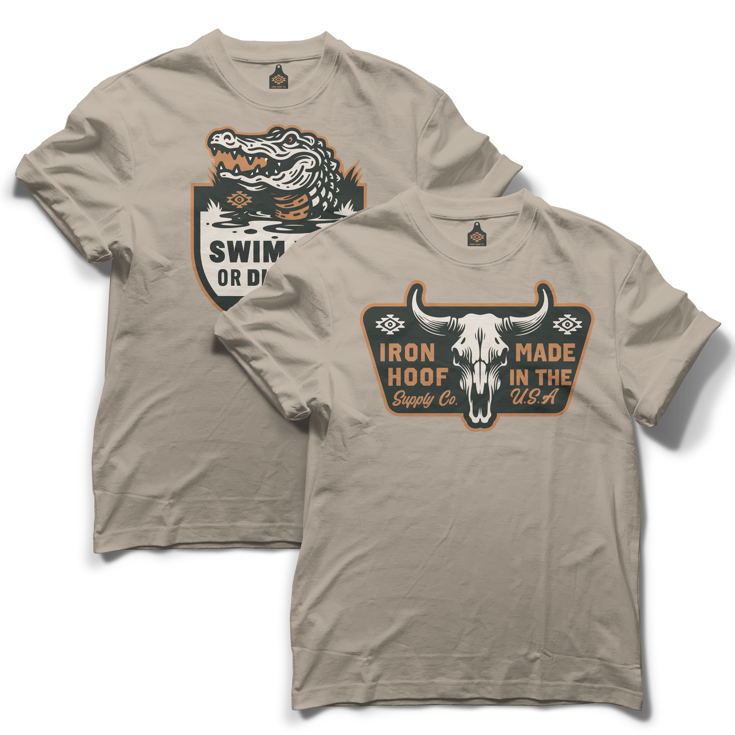 Two beige T-shirts with western-themed graphic designs. One features a crocodile with the words 'Swim or D.