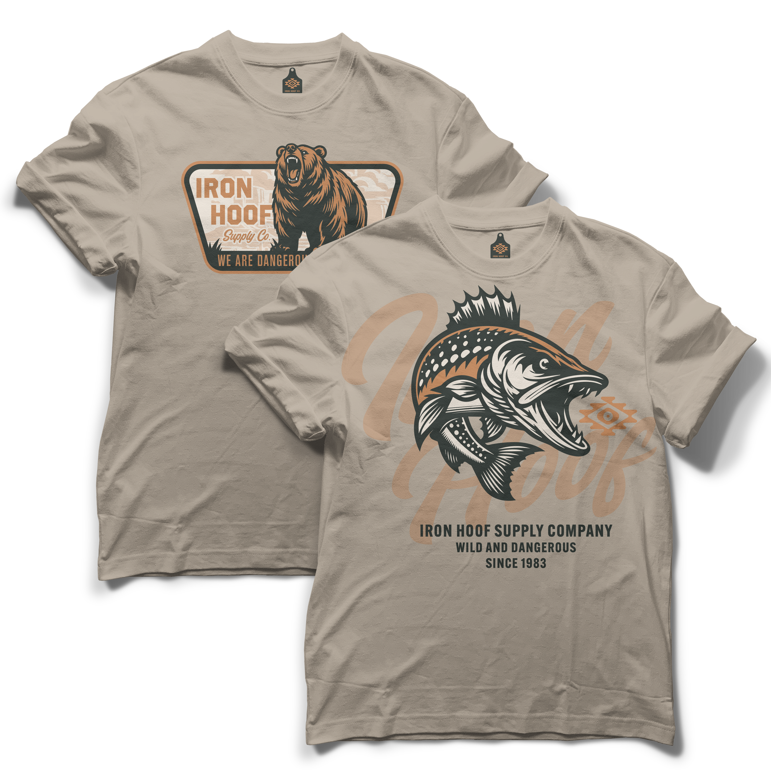 Two beige T-shirts with fishing and bear logos. The front of the shirts features detailed illustrations of a bear and a fish, along with text about Iron Hoof Supply Company.