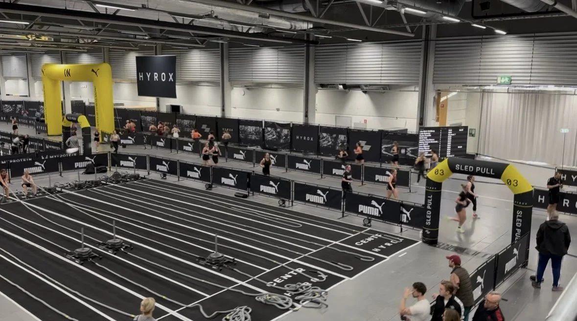 Picture of Hyrox Roxzone with running lap screen.