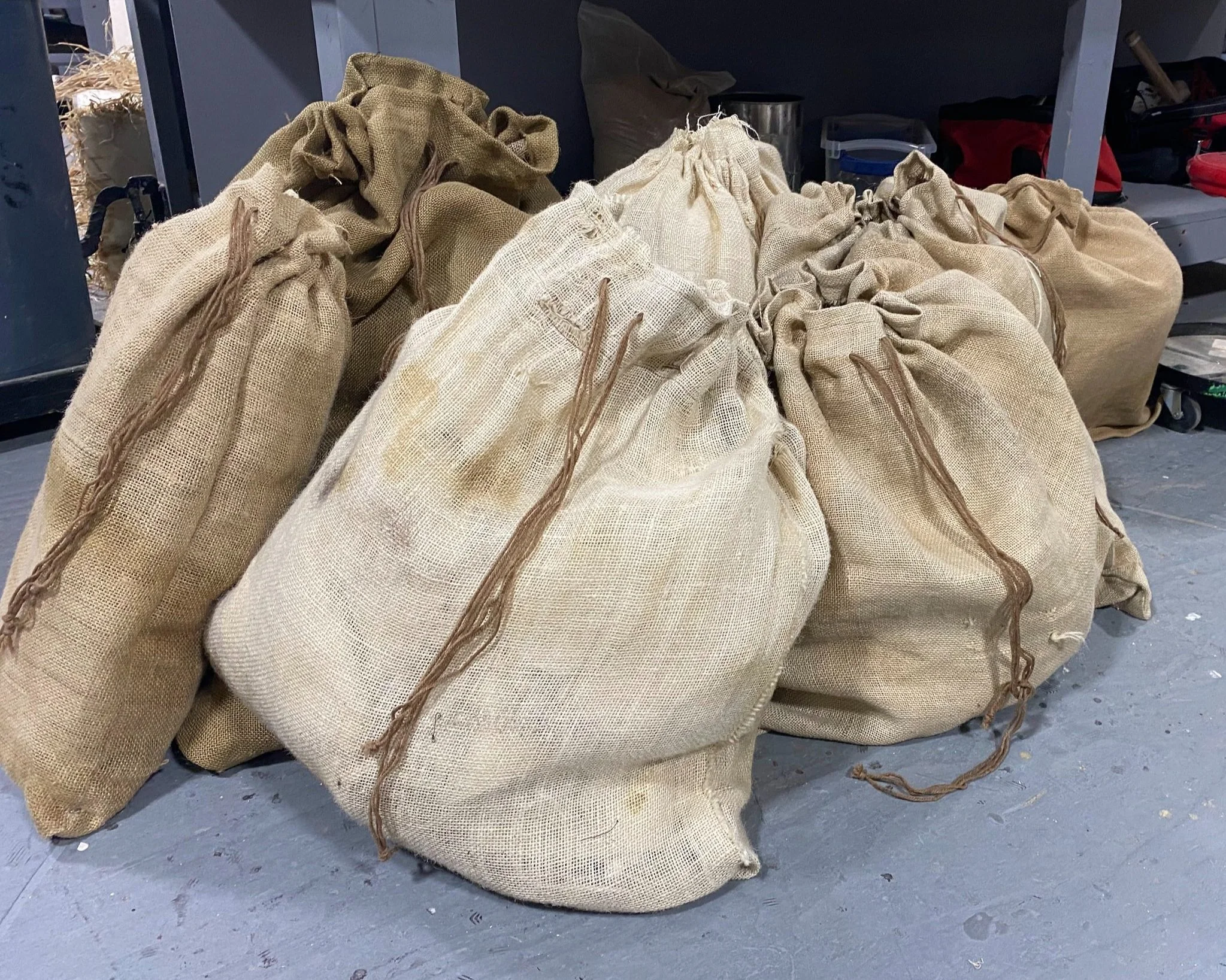 11 burlap sacks, constructed and reinforced, with added functional drawstring and velcro. (Joseph [...], MSMT '22)