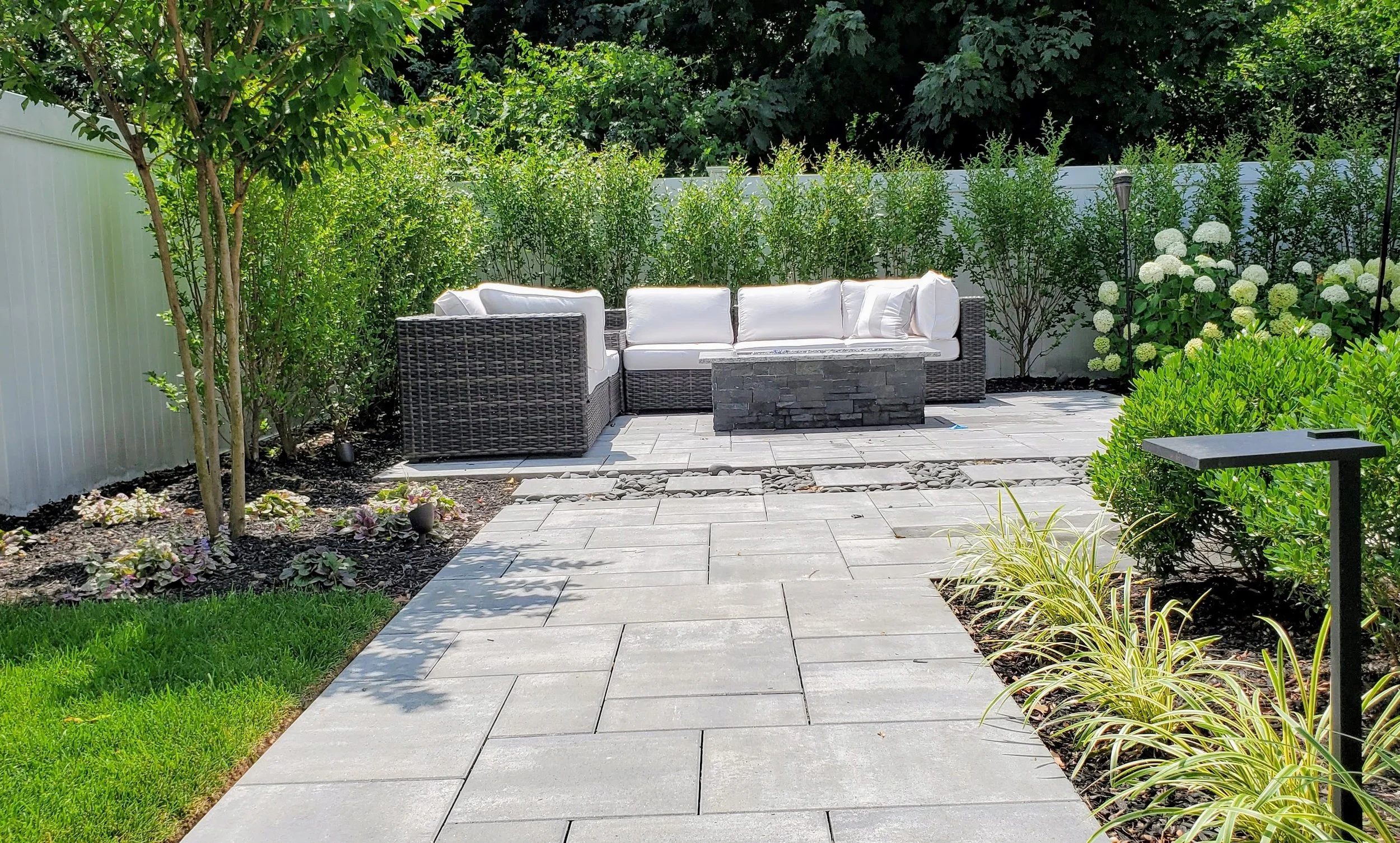 Landscape with patio installation.