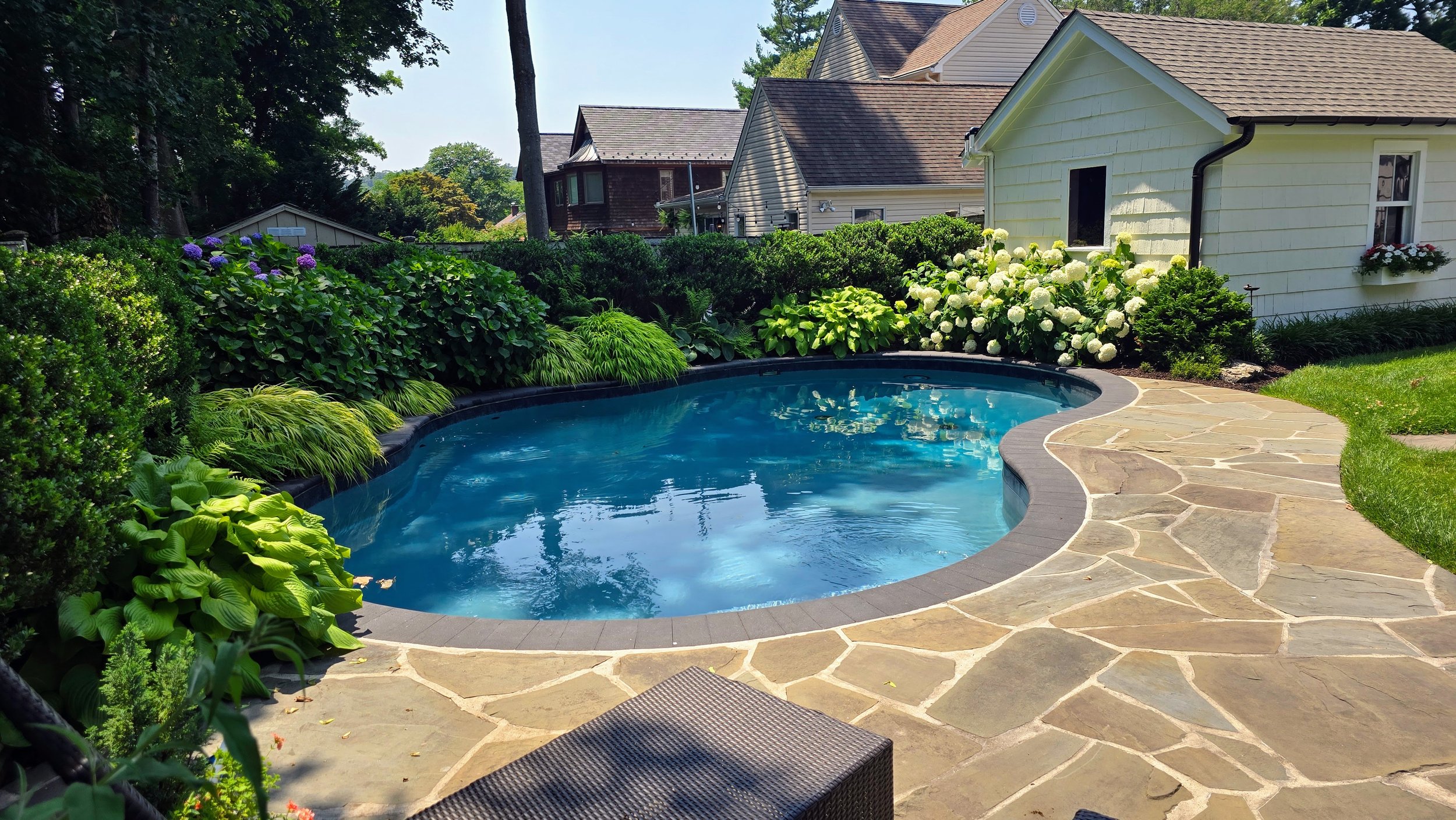 Irregular blue stone patio.
