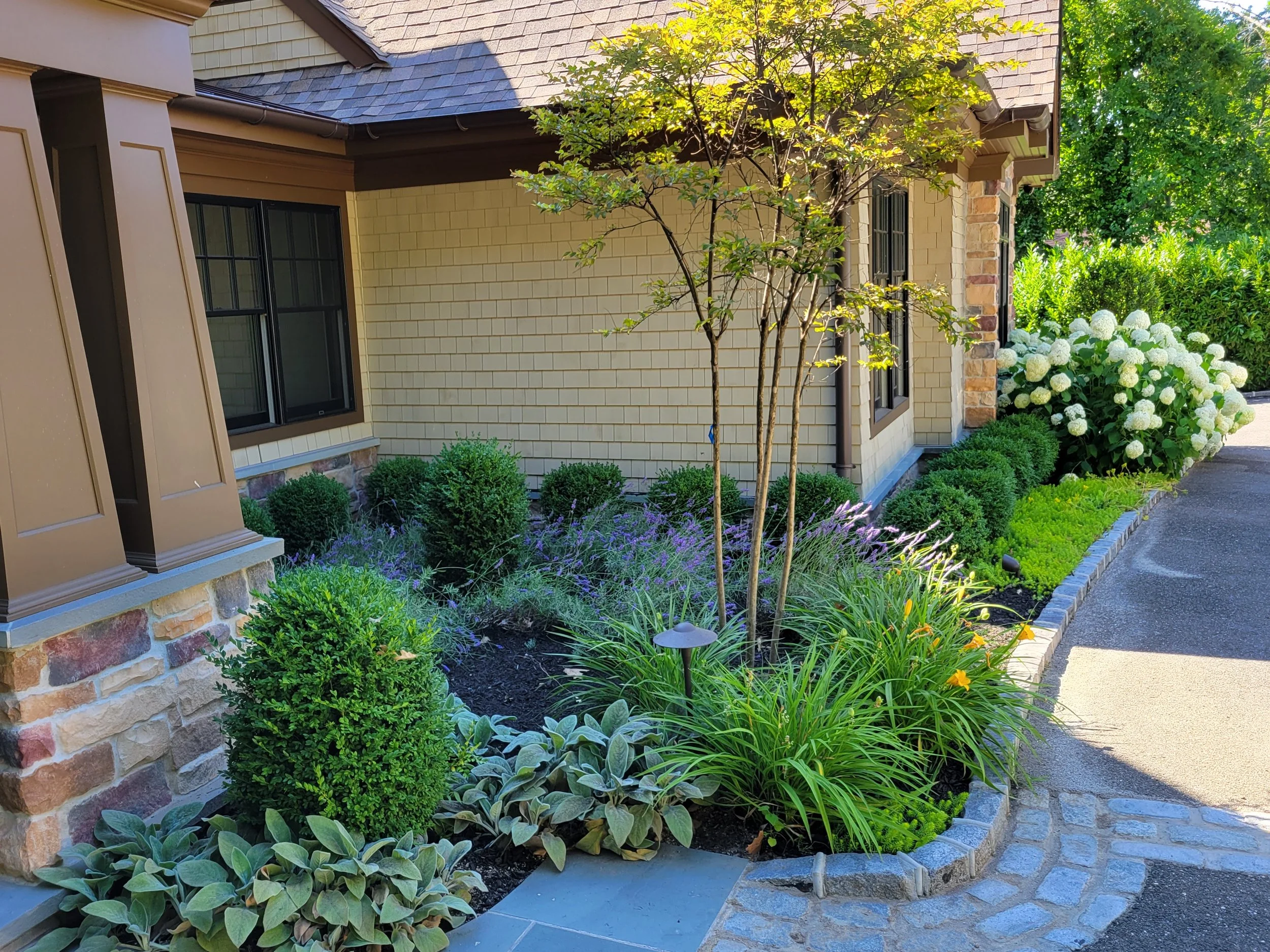 East Hills landscape and bluestone entryway.