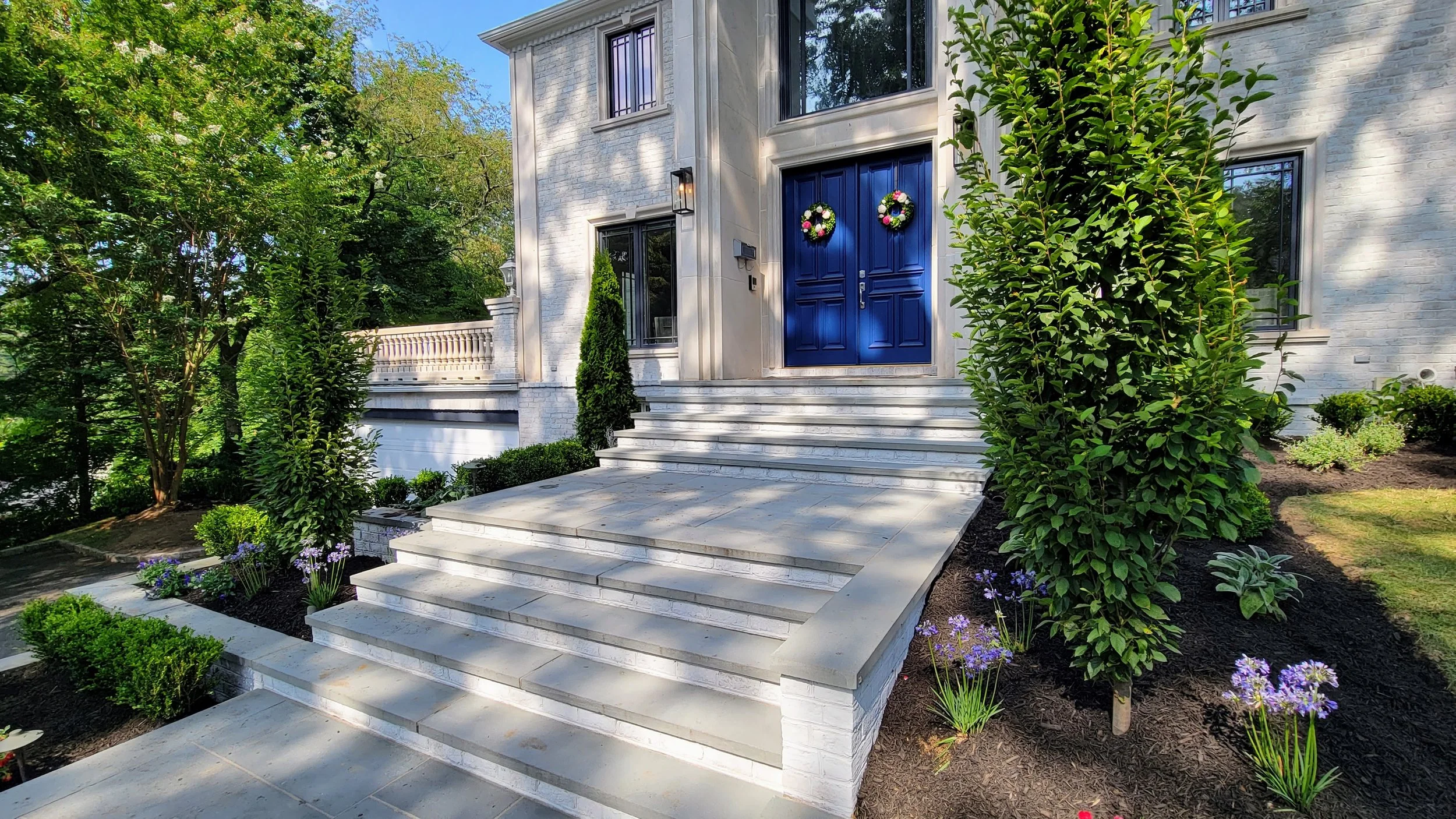 Manhasset landscape front entryway.