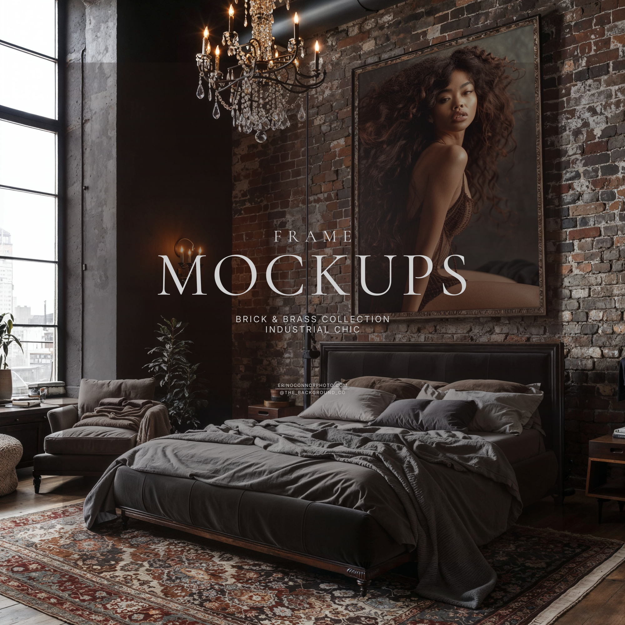 Moody loft bedroom frame mockup with exposed brick wall, ornate portrait frame above bed, crystal chandelier and large windows, ideal for showcasing art prints and photos.