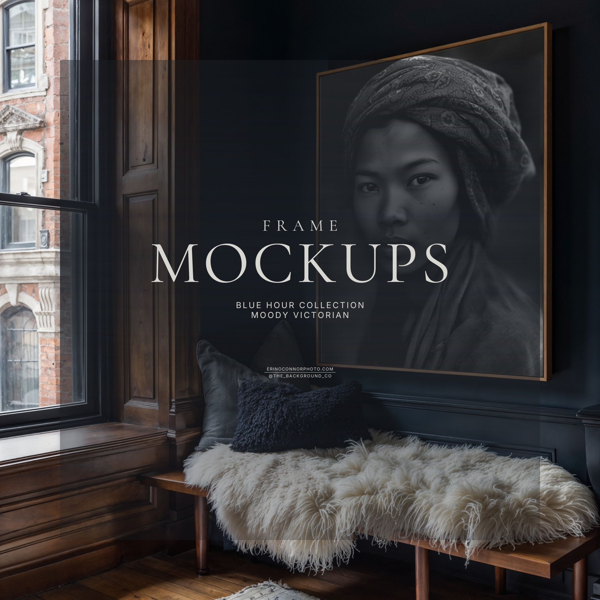 Moody Victorian window nook wall art mockup with large vertical portrait frame, dark blue walls, walnut trim, fur bench, and black and white portrait