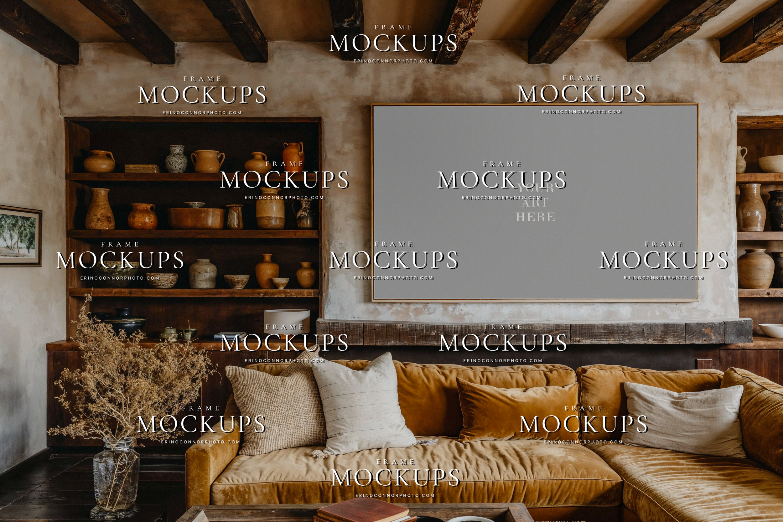 Rustic modern horizontal framed canvas mockup above a warm sectional with plaster walls, wood beams, built in shelves, and earthy pottery decor
