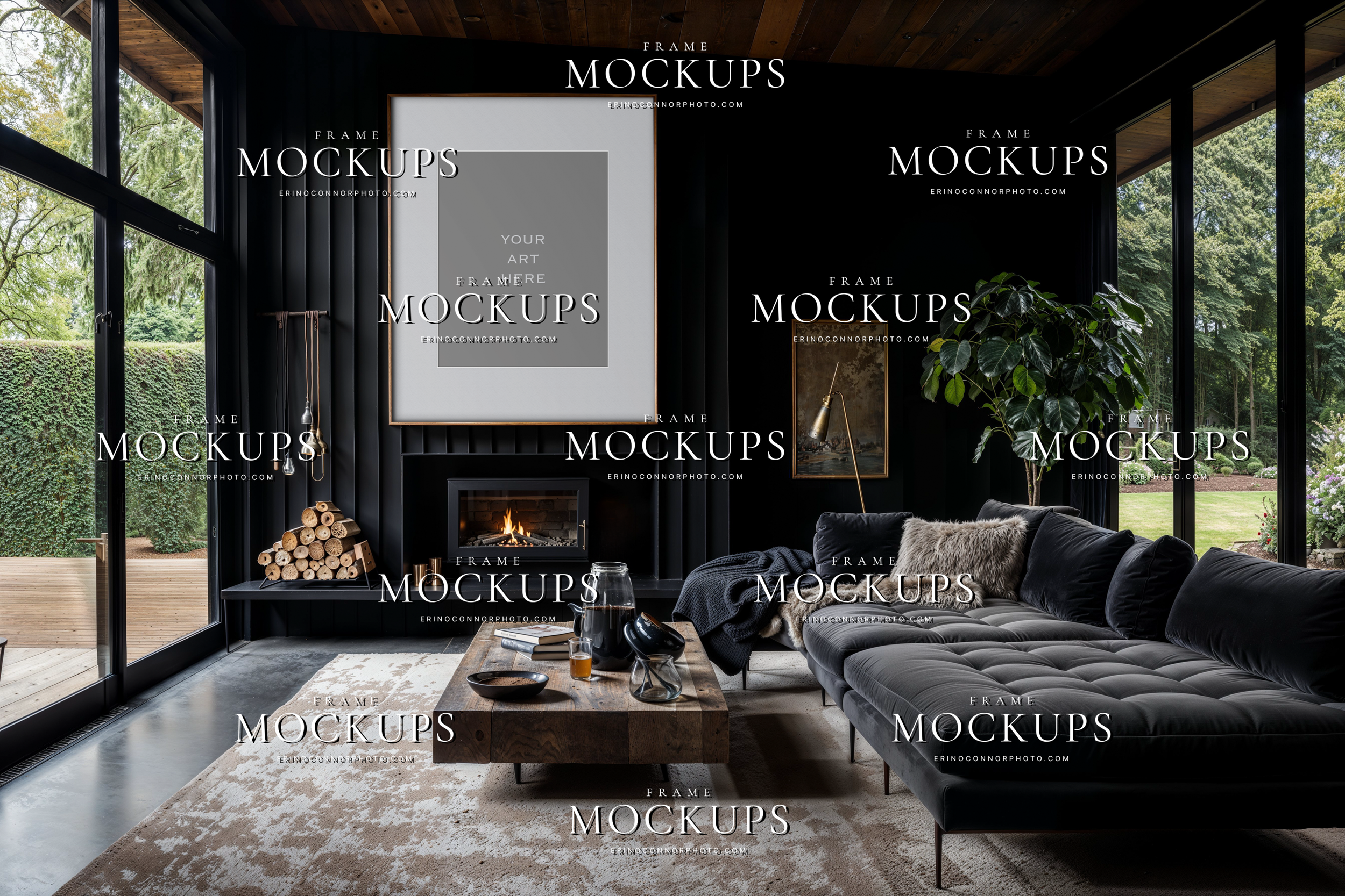 Modern rustic clean frame mockup with large landscape frame, black paneled walls, indoor tree, dark sofa, and wood coffee table in a moody designer living room.