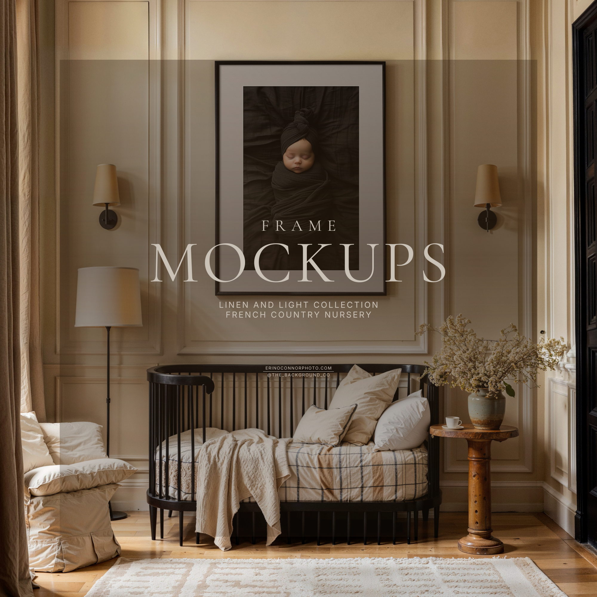French Country nursery frame mockup with vertical black picture frame above a black crib daybed, soft cream walls, classic molding, warm light, ideal for showcasing artwork or photos on a real wall.