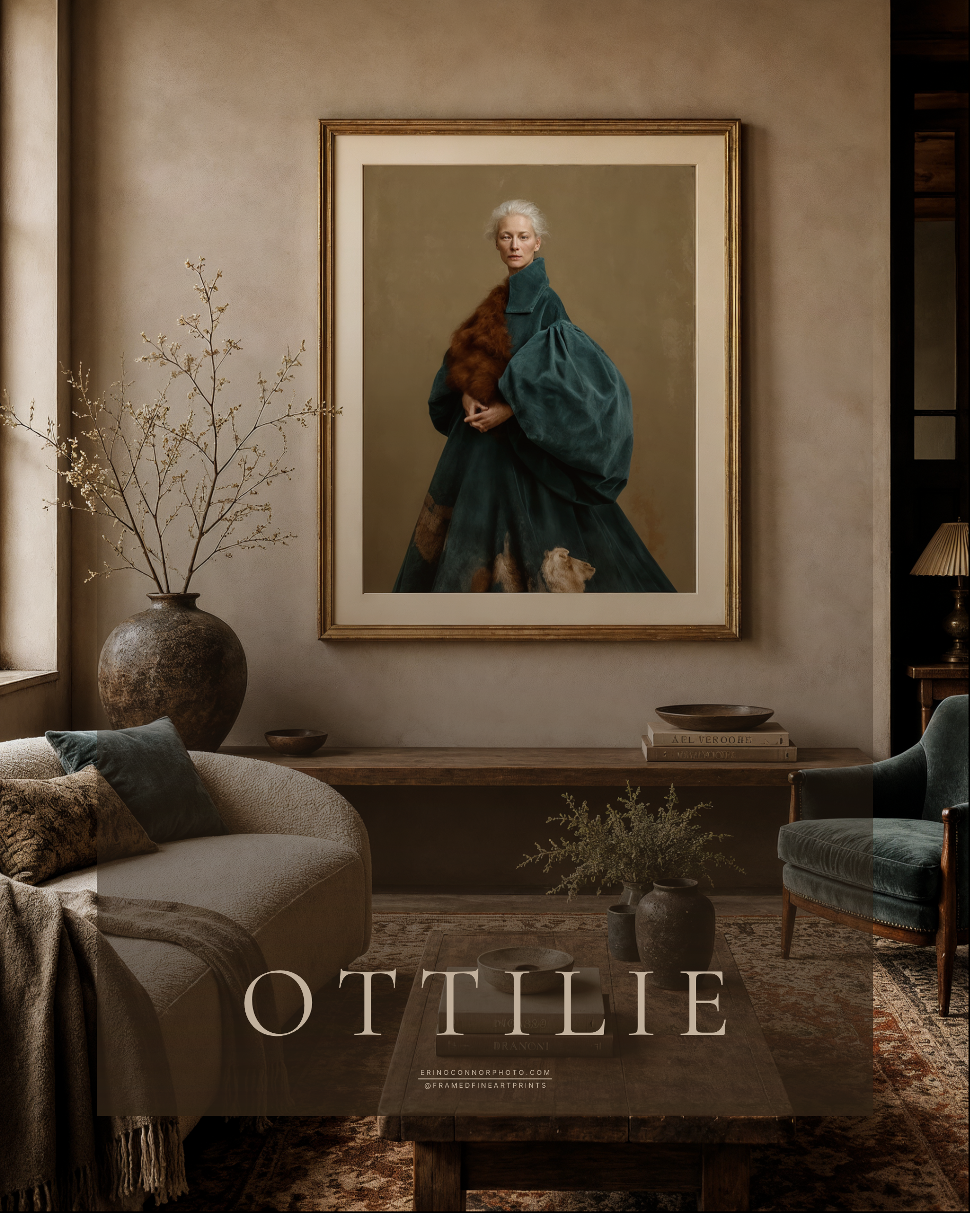 Large framed Ottilie portrait of a silver-haired woman in a sculptural teal garment displayed in a warm collected living room with vintage furniture.