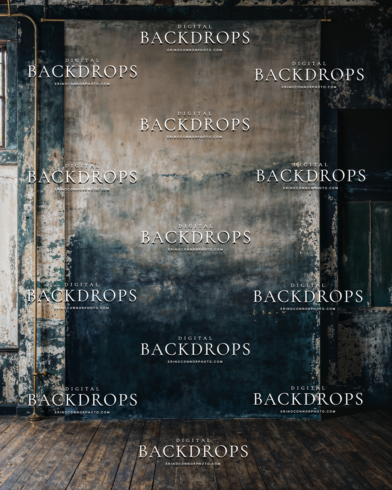 Vertical painterly studio canvas backdrop in a worn blue loft, warm taupe top fading into deep teal and navy, window light and aged plaster walls.