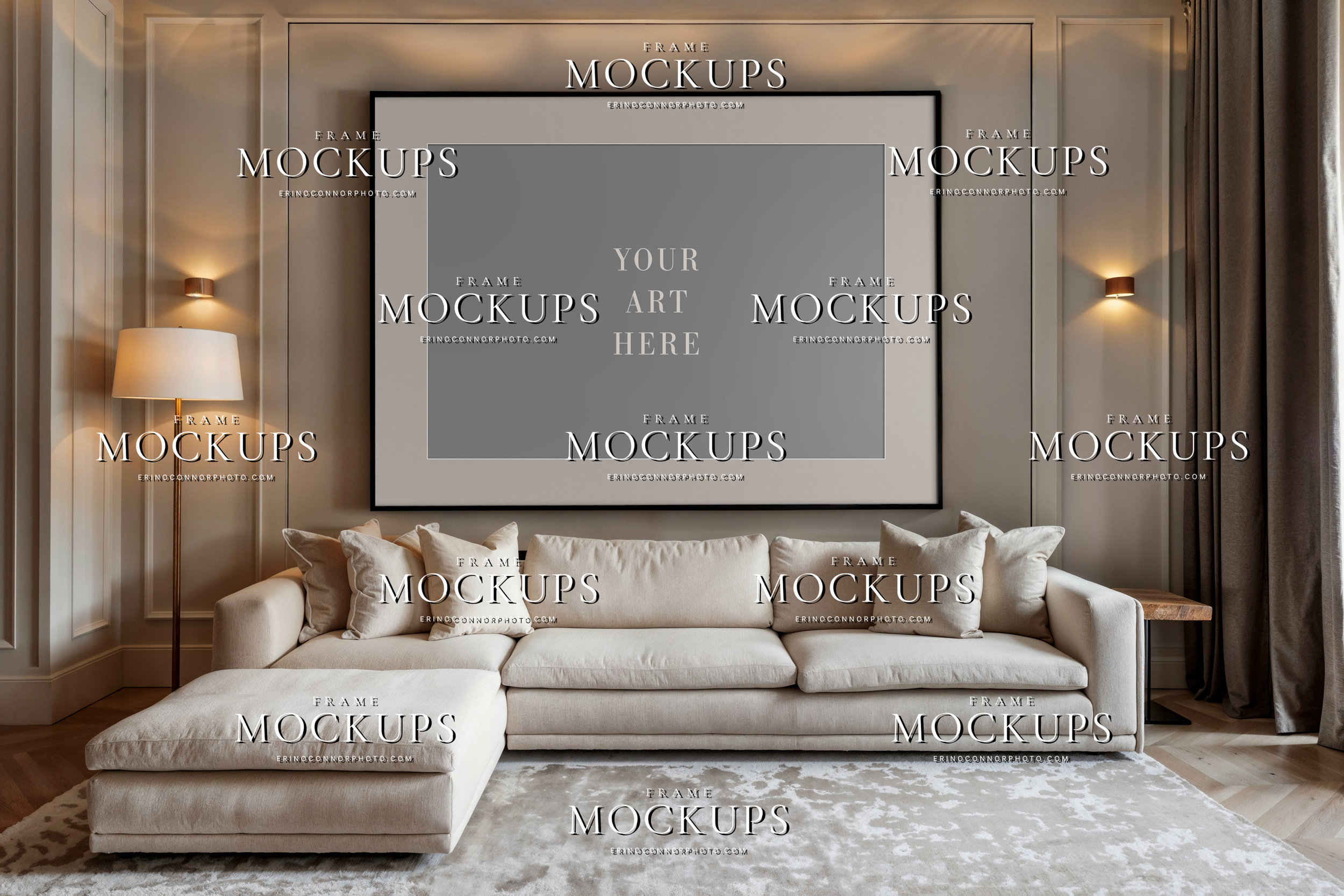 Contemporary living room wall art mockup with taupe panel walls, oversized sectional, and large horizontal black frame for photographers and artists presenting framed artwork.