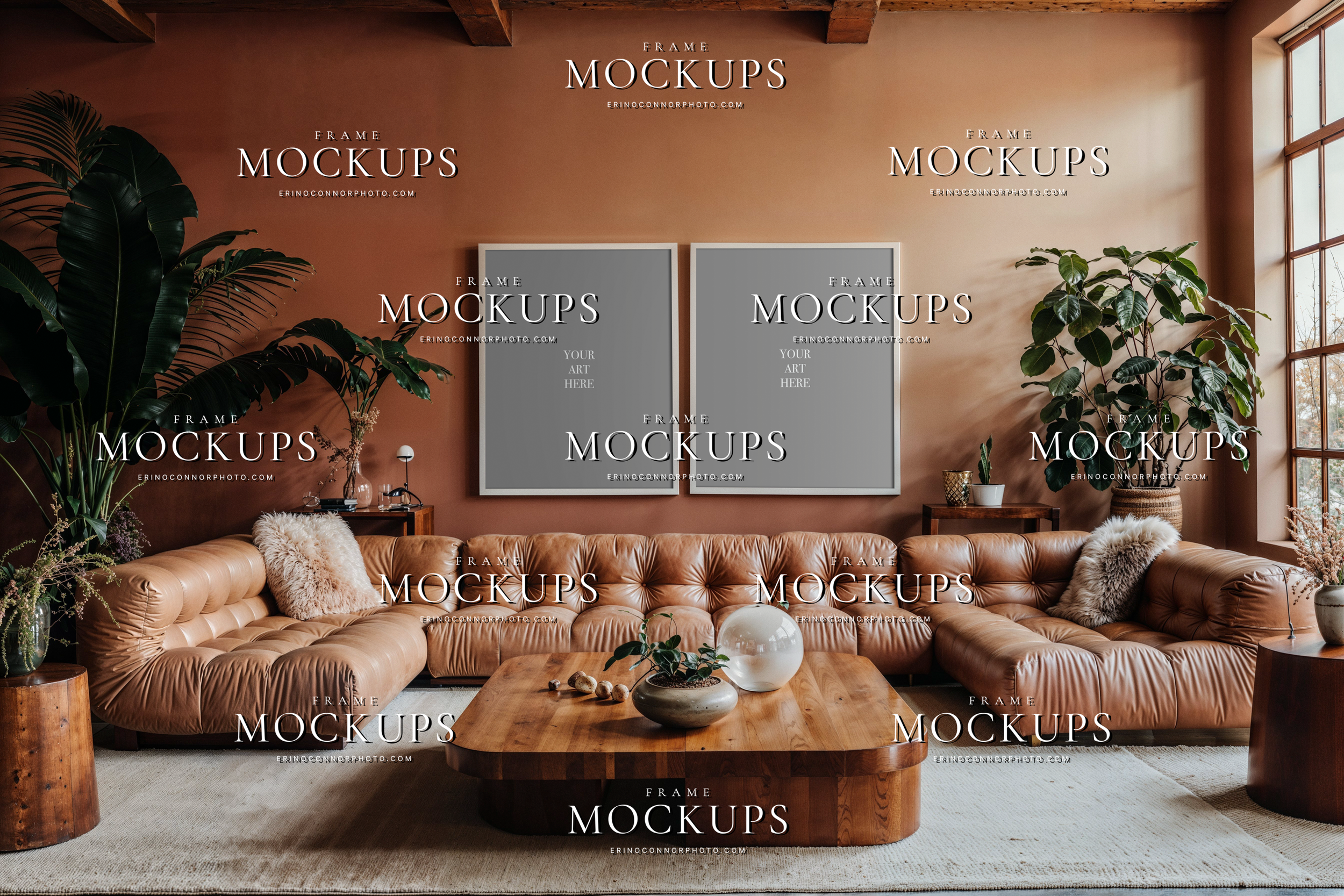 Empty two frame wall mockup in a California Casual living room with clay wall, cognac sectionals, leafy plants, wood table, and relaxed natural light